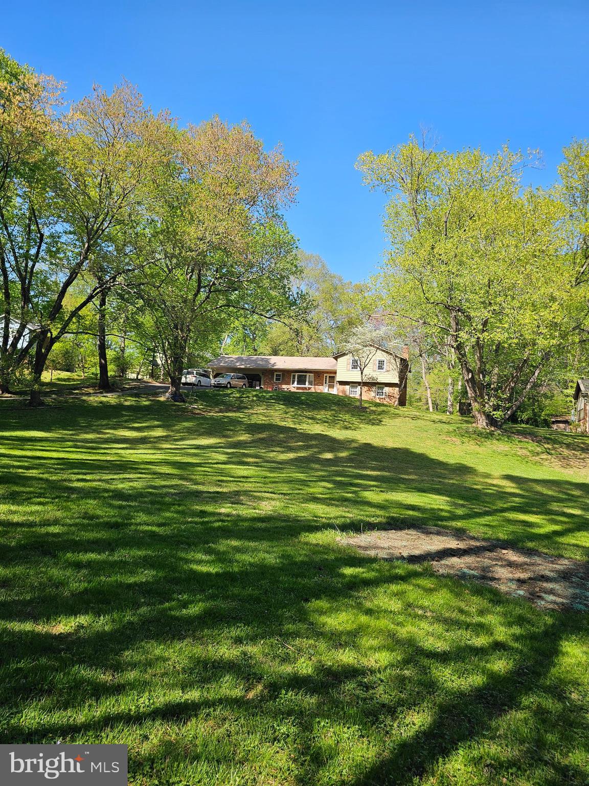 Large 4 br home with xtra guest br on lower level. 3 full baths. Many updates. Excellent condition. Roof in good condition but aging. Two layers. Seller has estimate of 15K to replace roof. But not needed. Very comfortable large home in wonderful location.