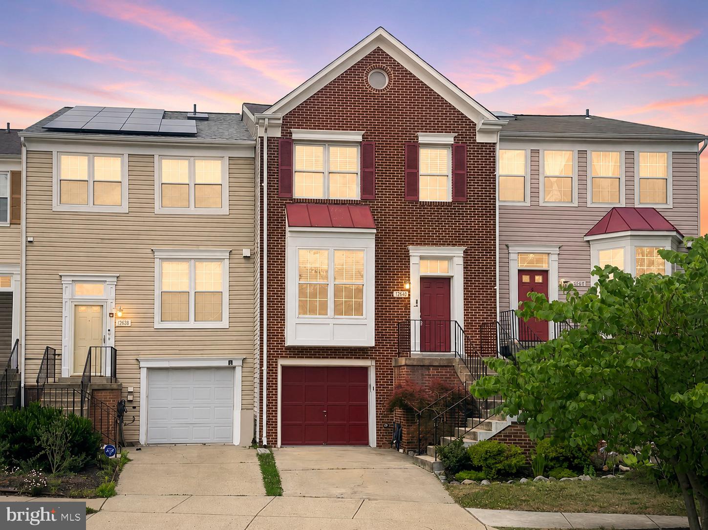 BRAND NEW roof with transferable warranty. Dazzling hardwoods. NEW carpet. Finished walkout basement. Fully fenced backyard. This move-in ready townhome checks all the boxes.

DON'T MISS the 3D Tour and Walkthrough Video! Located on a quiet cul-de-sac in Greenbelt, this 3-bedroom, 2 full bath, 2 half bath home offers three finished levels of living space and plenty of room to spread out. The bright main level features hardwood floors in the dining area, a cozy fireplace, and easy access to the large deck overlooking the fenced backyard.

Upstairs, you'll find a spacious primary suite with a private bath, plus two additional bedrooms and a second full bath. The fully finished walkout basement adds flexible space for a rec room, home office, gym, or guest area, along with a convenient half bath.

Parking is easy with a one-car garage, two-car driveway, and plenty of nearby visitor parking.

Both DC and Baltimore Commuters will love the location with quick access to I-495, BW Parkway (295), and Route 193. Just minutes from Greenbelt Metro and MARC Station, offering access to Metro, commuter rail, and one of the region's largest park-and-ride facilities. You're also just minutes from NASA Goddard, the University of Maryland, shopping, dining, parks, and highly regarded Eleanor Roosevelt High School.

Freshly painted top to bottom and very well-maintained. Just unpack and start enjoying your new home.