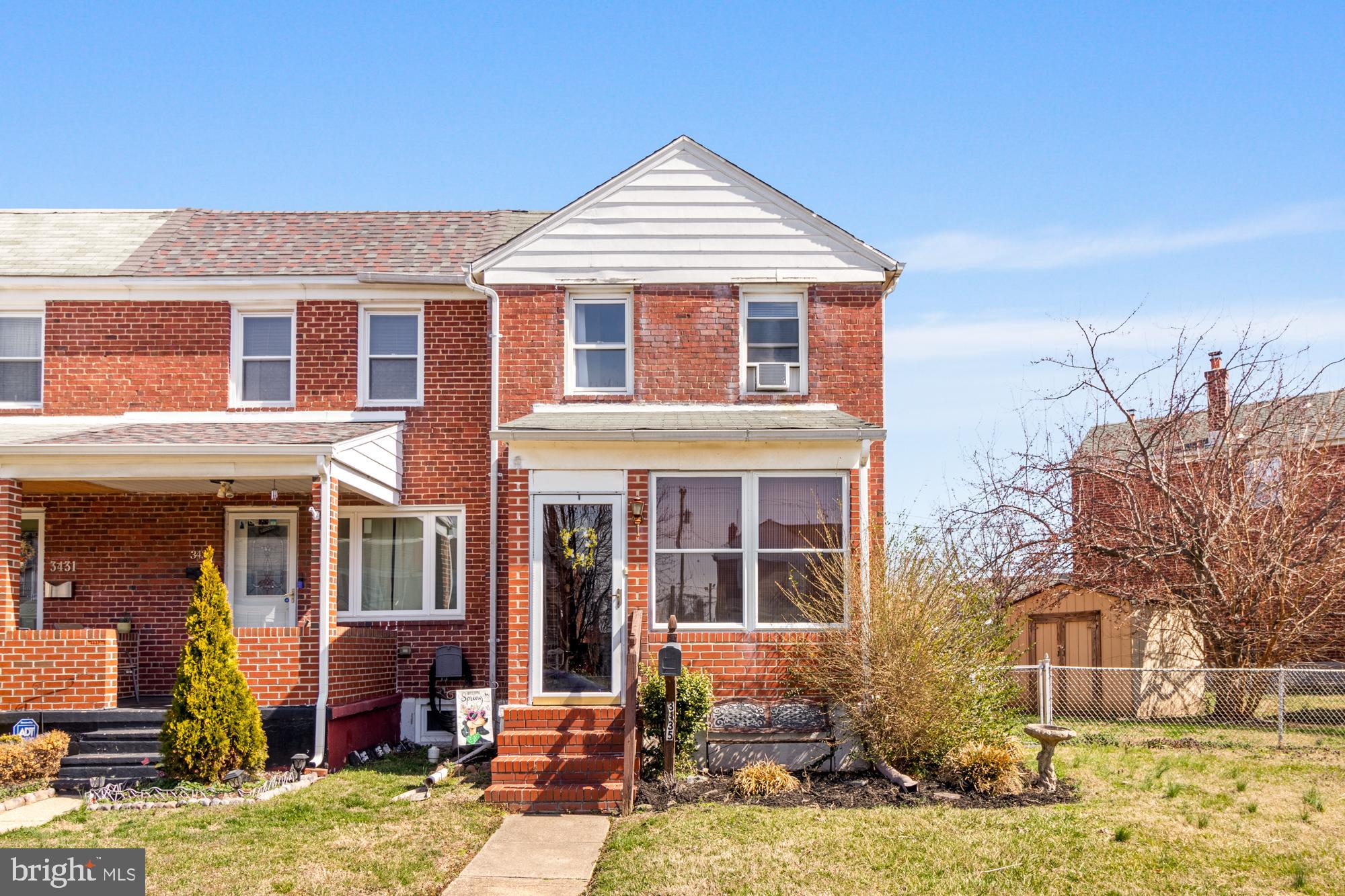 Welcome home to this classic brick end-of-group row home in Dundalk Village! Step through the enclosed front porch into a bright and inviting living room, featuring windows on both the front and side for an abundance of natural light. The main level flows seamlessly into the dining area and kitchen, which offers direct access to a spacious, fenced-in backyard and deck—perfect for outdoor entertaining. As an end-of-group home, this property boasts an expansive fenced side yard, providing more outdoor space than most homes in the community. If desired, the fence could be removed to create a private parking pad. Upstairs, you’ll find three comfortable bedrooms and a full bathroom. The partially finished lower level, complete with a half bath, offers a versatile space that can be used as a family room, home office, or playroom. The basement also features a large laundry and utility room with a walkout to the backyard for added convenience. Ideally located near shopping, recreation, and major highways, this home is a fantastic opportunity. Schedule your showing today!