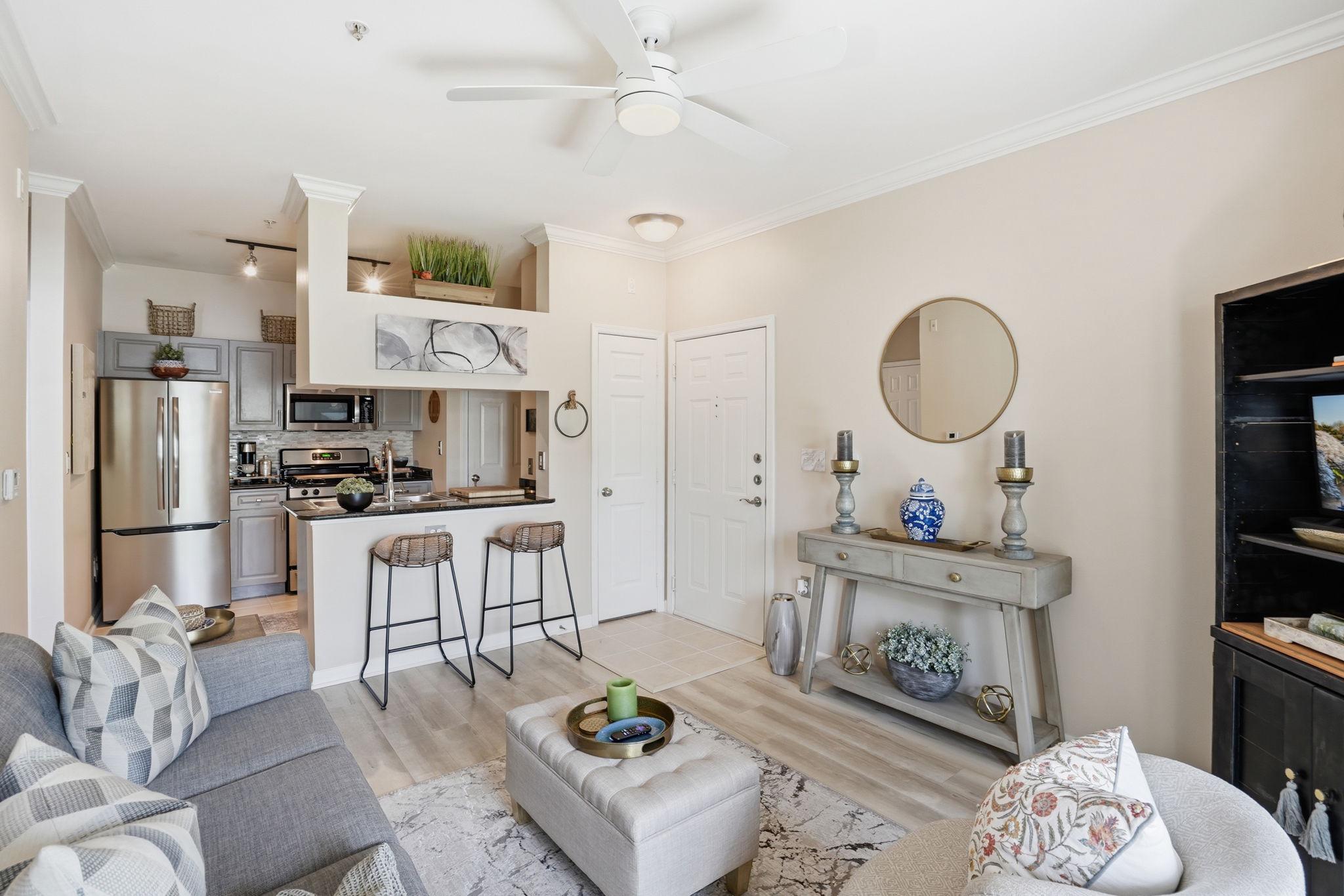 Completely move-in ready and thoughtfully updated, this 1-bedroom, 1-bath condo at Bryson at Woodland Park offers an easy, connected lifestyle in a prime Herndon location near the Herndon-Monroe Metro, Dulles Airport, shopping, dining, and everyday essentials. Inside, the layout feels bright and efficient, with wood floors installed in 2023, fresh paint in 2023, updated window blinds in 2023, and a renovated full bathroom that gives the home a clean, current feel. The kitchen has been refreshed with stainless steel appliances and a modern backsplash added in 2024, creating a space that feels both polished and practical for daily living.

Recent improvements make this home especially appealing for buyers looking for a low-maintenance condo with real updates already completed. New HVAC 2026. The refrigerator was replaced in 2024, the microwave in 2025, the stacked washer and dryer in 2024, and the hot water tank in 2025. Ceiling fans were added in 2025, bringing another layer of comfort to the living space. With level entry on the main floor, in-unit laundry, and an immediate move-in option, this home is well suited for anyone searching for a condo near the Silver Line Metro, a first home in Northern Virginia, or a turnkey property close to major commuter routes.

Bryson at Woodland Park adds even more value with amenities that support both convenience and downtime, including a gated entry, pool, fitness center, clubhouse, and community gathering spaces. The location puts you within walking distance of Harris Teeter, a local brew pub, and a coffee shop, so errands and weekend plans feel simple. You are also just about 8 minutes from Dulles Airport and close to the Dulles Toll Road, making travel and commuting easy. With assigned parking, a pet-friendly setting, and a location that keeps you close to Herndon, Reston, Metro access, and daily conveniences, this is a smart, stylish option for buyers who want an updated condo with comfort and connection built in.