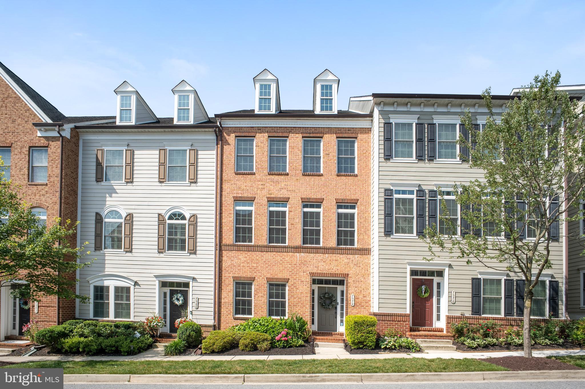 Experience elegant living at 7578 Morris St., ideally located on a quiet street in Maple Lawn’s desirable Hillside District. This impressive three-level townhome offers more than 2,800 square feet of beautifully designed living space, with three spacious bedrooms, two full baths, two half baths, and picturesque views.

Enjoy privacy and convenience with easy access to the main road and a peaceful rear setting overlooking a wooded area and pond. The open and airy main level features generous living and dining spaces, along with premium hardwood stairs installed in 2024, luxury vinyl flooring added to the first and third floors in 2025, and an EV charger already installed for added convenience.

The beautifully appointed kitchen includes stainless steel appliances, granite countertops, abundant cabinetry, and an oversized center island ideal for gathering and entertaining. Step onto the rear deck to enjoy tranquil forest and pond views.

Upstairs, the luxurious owner’s suite features a spa-inspired bath with an oversized dual-head shower. Two additional bedrooms, a full hall bath, and convenient upper-level laundry complete the bedroom level.

The finished lower level offers flexible space for recreation, media, or a private home theater, plus a half bath with the potential to add a tub.

Located near Maple Lawn’s shops, restaurants, community amenities, major commuter routes, and BWI Airport, this exceptional home offers an ideal blend of comfort, privacy, and convenience.