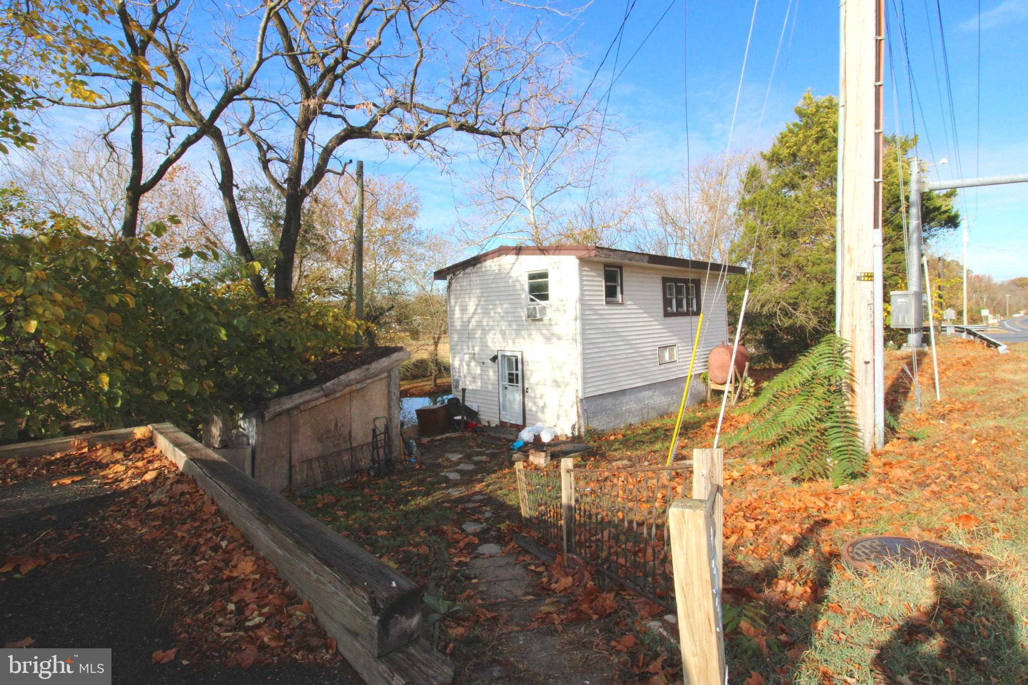 Investor Alert! Bring your imagination and turn this home into a gem with a water view  in charming Greensboro.    Minutes to several state parks, recreational facilities, restaurants, cafes and shopping.  Schedule your tour today and also experience the Town's rich history,  outdoor activities on the Choptank River such as fishing, kayaking or just enjoy the nature .