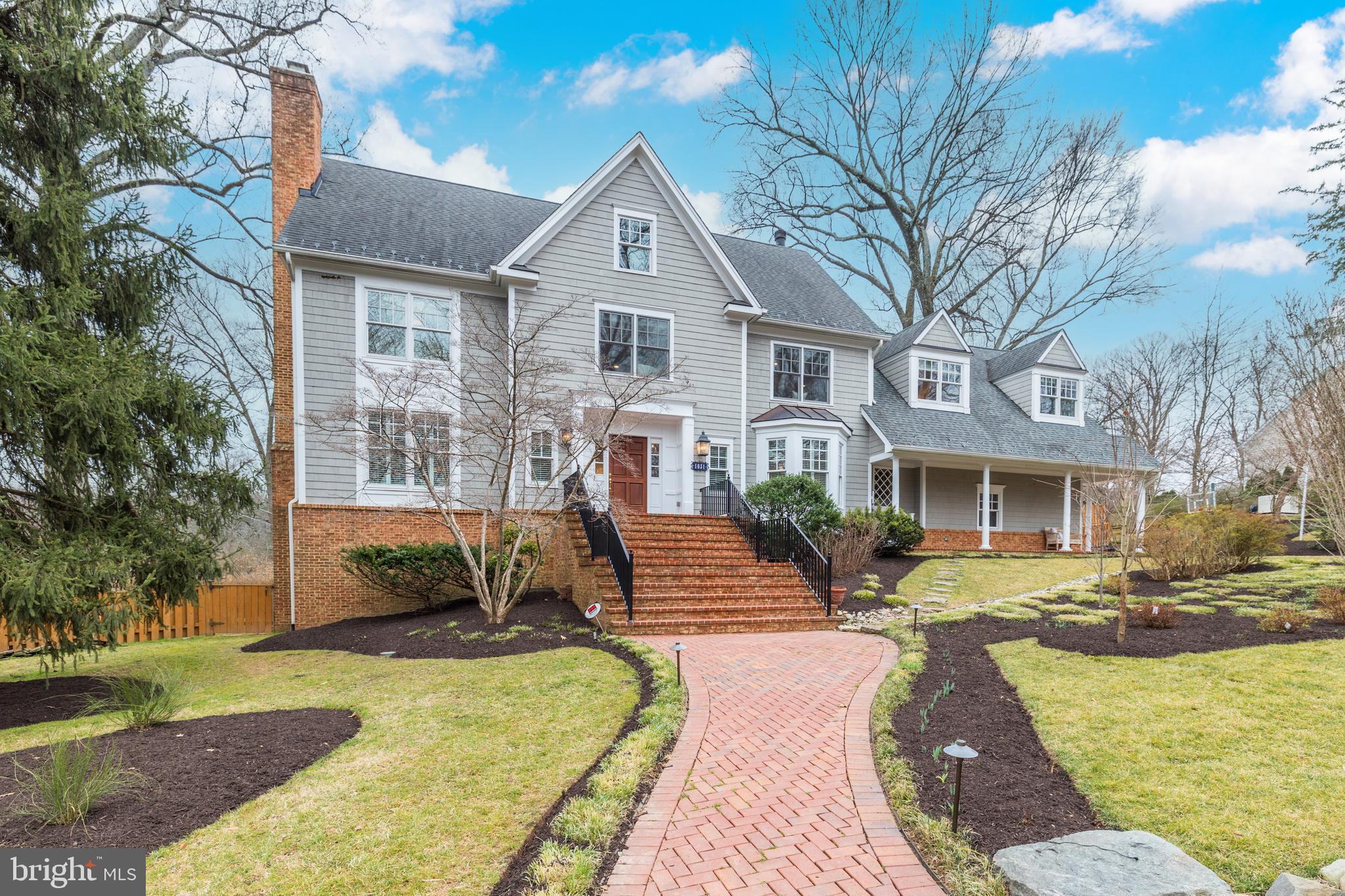 Classic shingle Nantuket style home in sought-after Franklin Park.  Sited atop a  wonderful half acre lot, the pristine landscape and brick walkway sets the tone for this Franklin Park home which offers approximately 5800+/- square feet on four finished levels.  The two story foyer leads to the formal living room with fireplace and dining room, or branches off to a comfortable family living area with Sonos audio hookup, fireplace, bar with double wine coolers + sink, and screened porch access. The screened porch looks out to the fully fenced rear yard’s fish pond, installed in 2017.  Both a front side entrance and rear mudroom entrance lend easy access to the casual spaces of the property, and the kitchen is generously equipped with custom cabinetry, silestone counters, gourmet appliances, and a bay window to bring the outdoors in, illuminating a breakfast area.  The second level houses an expansive master suite that offers a sitting room with gas fireplace and tray ceiling, two walk-in closets, and stunning renovated bathroom with steam shower, a perfect space for private relaxation. An upper foyer accents this home’s curated modern conveniences, with access to an attic level loft that also doubles as an additional bedroom with full bath. On the main bedroom level, ensuite bathrooms and walk-in closets are provided for two secondary bedrooms. A third secondary bedroom as well as a laundry room complete this level.    A private backyard retreat features landscape lights, fabulous screen porch, irrigation, a generator, and outdoor entertaining areas. Enveloped by mature trees and lush landscape, a hot tub adds to the appeal while a detached shed offers great outdoor storage solutions.  The walk-out lower level adds the final touch to the amenities, with the recreation room’s exterior door leading to the hot-tub patio. The sixth bedroom and another bath complete this level. New interior and exterior paint and light fixtures were completed this year, and the home was completely renovated from the studs up, including a new roof in 2013. All of the electrical wiring and water pipes were replaced, as well as the heating and air conditioning systems, water heater, and hot tub.   Franklin Park is known for its natural landscape, mature trees, and charming rolling hills. This home offers access to the best of McLean with its close proximity to all the Downtown McLean and Downtown Arlington have to offer. It is ideally situated just minutes to the George Washington Parkway, I-66, Tyson's Corner, and the Capitol Beltway.
