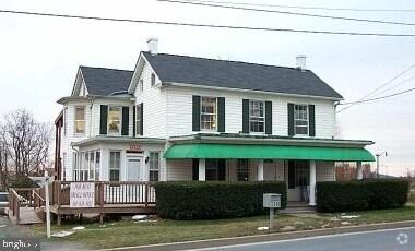 Nestled in a charming locale, this exquisite commercial lease opportunity offers a unique blend of historic elegance and modern functionality. The property boasts a timeless character that is both inviting and sophisticated, making it an ideal setting for a variety of high-end business ventures. There are 4 offices available on the 2nd floor, this being one of them. The expansive lot, spanning nearly half an acre, provides ample space for your clients.The well-maintained exterior invites you to explore the possibilities that await inside. The interior, while currently a blank slate, offers the perfect opportunity to create a bespoke space tailored to your business needs. With high ceilings and an abundance of natural light, the atmosphere is both uplifting and inspiring, fostering creativity and productivity. Parking is a breeze with a dedicated parking lot, ensuring convenience for both clients and employees alike. The property's strategic location enhances accessibility, making it a prime choice for those seeking to establish a prestigious presence in the community. The lease terms are negotiable, providing flexibility to accommodate your specific requirements and vision. A sophisticated office space, this property is poised to elevate your business to new heights. Imagine the lifestyle this location offers-surrounded by a vibrant community, with easy access to local amenities and attractions. The charm of the neighborhood complements the elegance of the property, creating an inviting atmosphere that will resonate with your clientele. This is more than just a space; it's an opportunity to create a legacy. Situated in a charming, character-rich building, the suite delivers a professional presence that immediately inspires confidence in clients while maintaining a welcoming, approachable feel. Don't miss the chance to make this distinguished property your own and step into a world of luxury and success.