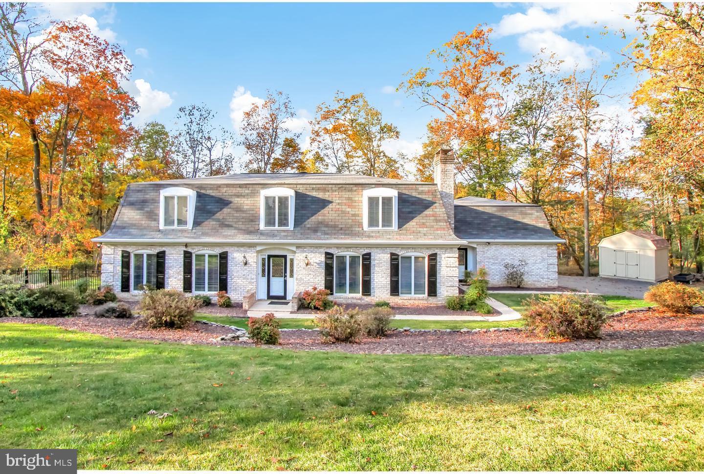 YOU'LL LOVE THE PRIVATE TRANQUIL SETTING WHERE NATURE IS PLENTIFUL RIGHT IN YOUR OWN BACKYARD.  WHETHER YOU ARE BEGINNING YOUR DAY WITH COFFEE ON THE DECK OR SCREENED IN PORCH OR ENDING IT WITH A GLASS OF WINE...YOU'LL FEEL THE CALMNESS & ENJOY THE SIGHT OF DEER, FOX, ETC.  THIS 3 BEDROOM HOME IS TUCKED AWAY ON A DEAD END STREET YET HAS EASY ACCESS TO ALL IN-TOWN CONVENIENCES.  BOASTING APPROX 3600 SQ FT THE ROOMS ARE GENEROUS IN SIZE.  GORGEOUS RENOVATED KITCHEN IS A COOKS DELIGHTS COMPLIMENTED W/GRANITE COUNTERS, SS APPLIANCES & SOFT CLOSE CABINETS* THE LAUNDRY IS CONVENIENTLY LOCATED ON THE 1ST FLOOR*ANDERSEN WINDOWS ARE AN AWESOME EFFICIENT UPGRADE*THE FAMILY ROOM HAS A PELLET STOVE INSERT WHILE THE FIREPLACE JUST ADDS TO THIS HOME*  TALK ABOUT NATURAL SUNLIGHT WITH THE FLOOR TO CEILING WINDOWS IN THE DINING AREA WITH PICTURESQUE VIEWS*THE GARAGE IS OVERSIZED W/AN INSULATED DOOR INCLUDING SHELVING & CABINETRY*ADDITIONAL ROOMS FOR SO MANY OPTIONS...YOU CHOOSE!  CENTRAL AIR ONLY ON 2ND FLOOR*MANY RENOVATIONS HAVE BEEN DONE...NEW ELECTRIC STOVE/OVEN*WELL TANK REPLACED 4/26*NEW SHUTTERS*