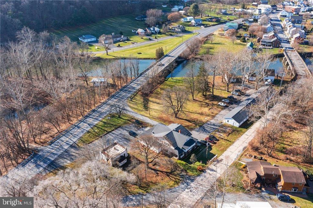 UNIQUE INVESTMENT OPPORTUNITY in this 20 unit property situated on just shy of 10 acres consisting of two parcels and a short 20 minute commute to the Lehigh Valley. This property consists of 2-3BR units, 2-2BR units, 11-1BR/ efficiency units, 3 storage spaces, a workshop with garage, and a commercial garage. Plenty of value add and upside potential with rent increases and the potential to add more units. Check with zoning and the local municipality regarding options. All residential units are fully occupied with 1 year leases/security deposits in place. Owners pay W/S/T and common electric. All utilities are separate and tenants pay heat(electric), electric, and cable. New roofs and windows were recently installed on all the main buildings and commercial garage. List price reflects a cap rate of over 12% based on current rents and occupancy. Don't miss out on this unique opportunity!!!