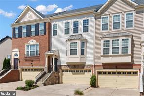 Perfect location This contemporary townhome is located less than 3  minutes from I95, all shopping needs, and more!Beautiful open kitchen design with a huge island with quartz top and stainless appliances. Barely lived in, this stunning home boasts 3 bedrooms, two and two half bathrooms, and a spacious two-car garage. Gorgeous open layout with an abundance of natural light flowing in from large windows, enhanced with recessed lighting. Upgrades galore including bright upgraded cabinets,