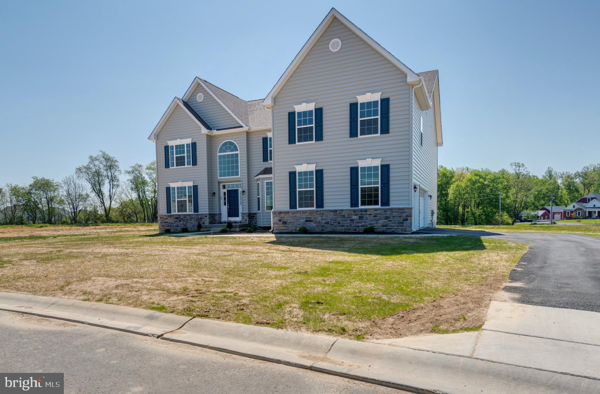 The Gatsby is one of our finest floor plans. This model includes a stunning entrance to the formal living and dining rooms, a first-floor study, and a large, centrally located kitchen with an island. The two-story family room leads to a rear staircase. The second floor includes a guest suite with a private bath and a unique "Jack and Jill" bath. The owner's suite features a sitting room with a dressing area, large walk-in closets, a luxury bath with a garden tub, separate vanities, and a linen closet. This is a to-be-built home. Photos are of a similar home. Photos are for marketing purposes only and are not of the actual house. County, city, school taxes, assessment value, and square footage are approximate. For additional information about this to-be-built home, visit the model home in Hidden Brook-1153 Charleston Circle Dover.