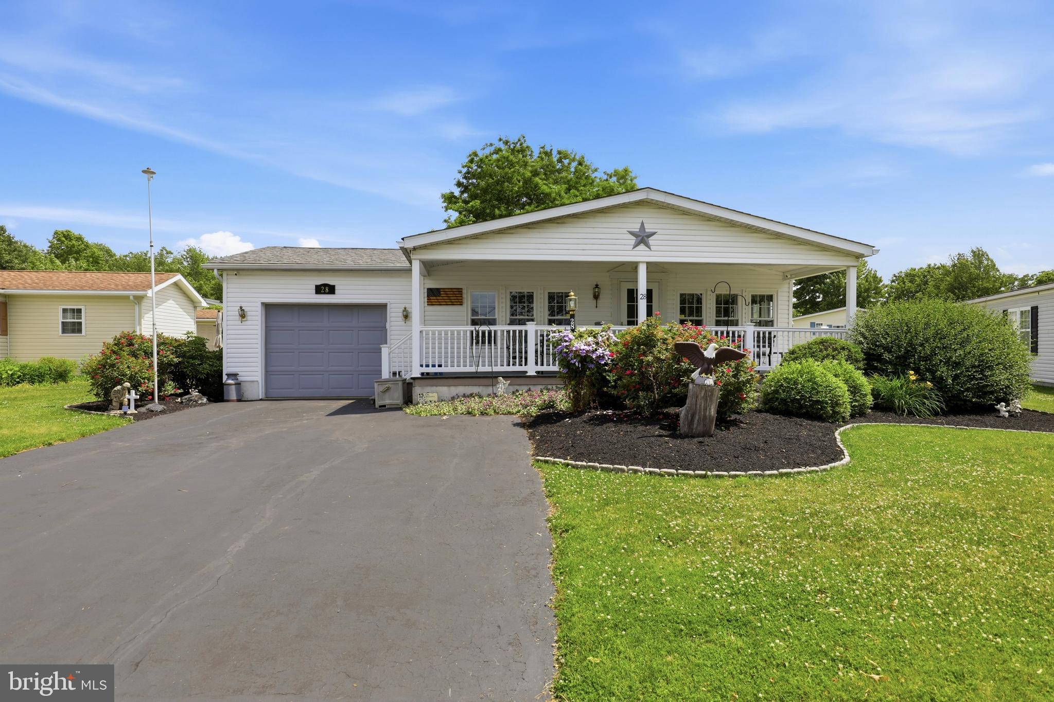 Welcome to this meticulously maintained 2-bedroom, 2.5-bath home in the desirable Village of Quiet Acres. From the moment you arrive, you'll be impressed by the beautifully manicured landscaping, pristine lawn, and inviting covered front porch that showcase the exceptional care this property has received over the years.

Inside, the home is bright, airy, and filled with natural light. Offering a spacious and versatile floor plan, you'll find both a comfortable living room and a separate family room, providing plenty of space for everyday living and entertaining. The eat-in kitchen is the heart of the home, complemented by a formal dining room for gatherings with family and friends.

The generously sized bedrooms and 2.5 baths provide comfort and convenience, while the attached one-car garage offers additional storage and easy access.

Set within the peaceful Village of Quiet Acres community, this move-in-ready home combines low-maintenance living with exceptional pride of ownership. Every detail has been lovingly cared for, making this a rare opportunity for buyers seeking a home that is truly turnkey.