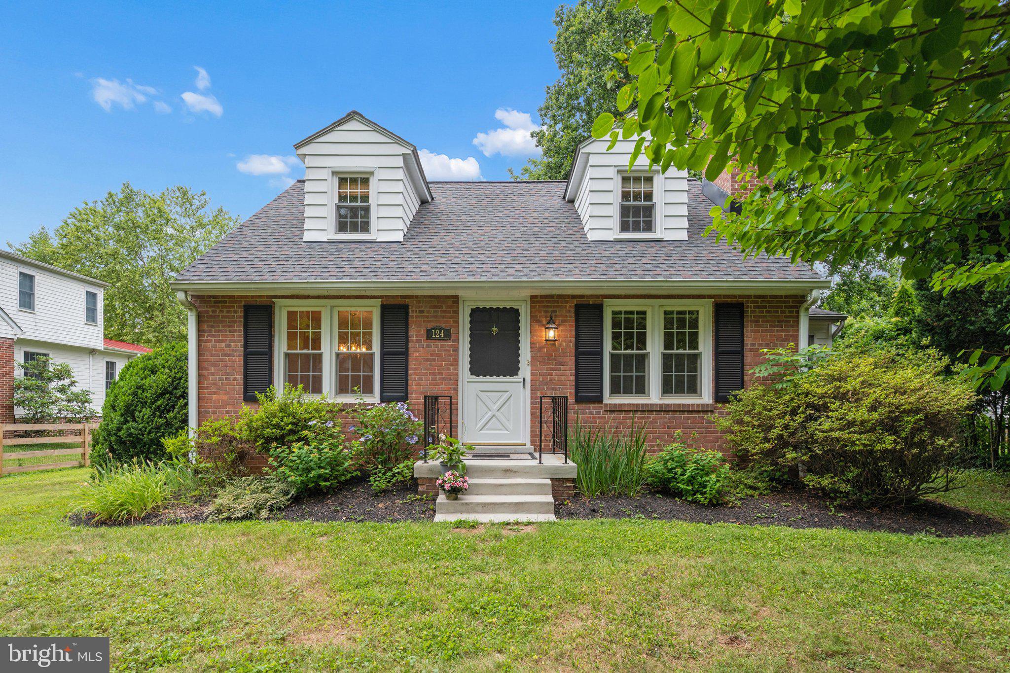 Absolutely charming Cape Cod tucked into a picture‑perfect, private setting. Thoughtfully updated while preserving its character, this 3‑bedroom, 2‑bath home features newly refinished hardwood floors, new carpet, refreshed baths, and an expanded table‑space kitchen with brand‑new refrigerator and stove. A One-Year Cinch Home Warranty is also included.
The main level offers a versatile floorplan with separate living and dining rooms, a cozy wood‑burning fireplace, and a bedroom with a charming built‑in. The unfinished walk‑out basement provides abundant storage, workshop potential, or the opportunity to finish for additional living space.
The .30 acre lot is beautifully landscaped.  Ample off-street parking in the rear path Hickory Road.  Chestnut Avenue in the front is a walking path and offers even more privacy.  A very cool and peaceful setting. Washington Grove is truly a best‑kept secret—an oasis rich with warmth, history, and community spirit. With more than 100 acres of forest preserve and parkland, residents enjoy tennis courts, baseball fields, playgrounds, a dog park, and even a private swimming lake tucked in the woods. Town traditions and year‑round events create a sense of belonging that is hard to find elsewhere.
Commuting is a breeze with the MARC train within walking distance and easy access to Shady Grove Metro, I‑270, and the ICC.
Come experience the charm, character, and community that make Washington Grove one of a kind.  OPEN HOUSE SUNDAY, 6/28 from 1- 3PM!