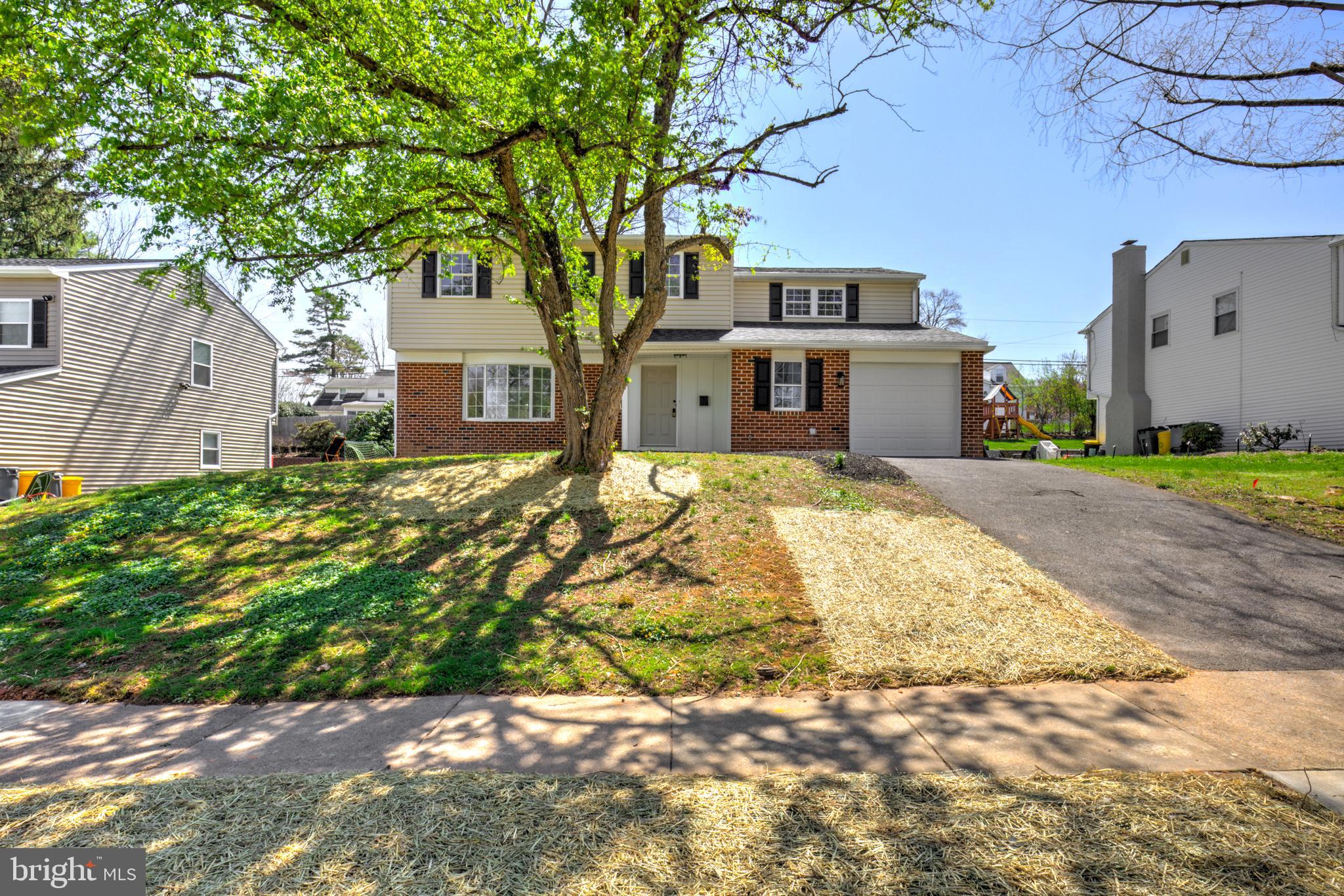 Welcome to 914 Longfield Rd - a freshly renovated 4-bedroom, 2.5-bathroom home nestled in a desirable, residential neighborhood in Glenside. This home has been thoughtfully updated with new paint, flooring, fixtures throughout creating a bright and refreshed space that is truly move-in ready. A brand-new architectural shingle roof also adds peace of mind for new owners! The traditional first-floor layout offers a welcoming living room with beautiful painted brick fireplace, a formal dining room, and an additional family room just off the kitchen, providing flexible living and entertaining options. At the heart of the home, the completely renovated kitchen features warm wood-tone cabinetry, quartz countertops, stainless steel appliances, and a large center island perfect for meal prep and casual dining. A convenient powder room, main floor laundry, and inside access to the one-car attached garage add everyday functionality. Upstairs, the spacious second level includes four generously sized bedrooms with new, cozy carpeting and two full bathrooms. These  include an enviable primary suite with a large bedroom and an expanded private bath complete with a double vanity and tiled walk-in shower. The second full bath features a tiled tub/shower combination. The basement is clean and offers excellent storage with the potential to be finished for additional living space in the future. Ideally located with easy access to local shopping, dining, parks, and major roadways, this home combines suburban comfort with everyday convenience. Don’t miss the opportunity to make this beautifully updated home your own!
