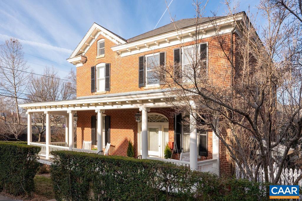 Completely restored in 2006 & lovingly maintained, this remarkable 1920s gem stands as a testament to thoughtful preservation, providing the perfect balance of historic elegance & modern functionality in one of Charlottesville's most desirable neighborhoods. This stunning 4-bedroom, 3.5-bathroom residence spans an impressive 3,733sf & showcases the perfect blend of period details & contemporary amenities. Main home boasts high ceilings with 3 bedrooms + dedicated home office. The studio apartment offers a 4th sleeping area with kitchenette + 3rd full bath giving the opportunity for many uses from rental apartment to home office/business to in-law/au pair suite. Property enjoys a 2 car garage + parking court for convenient off street parking. Basement & walk-up attic provides generous storage space. Located in historic North Downtown just 3 blocks to pedestrian mall and 1.1 miles to UVA Hospital.,Granite Counter,White Cabinets,Fireplace in Dining Room
