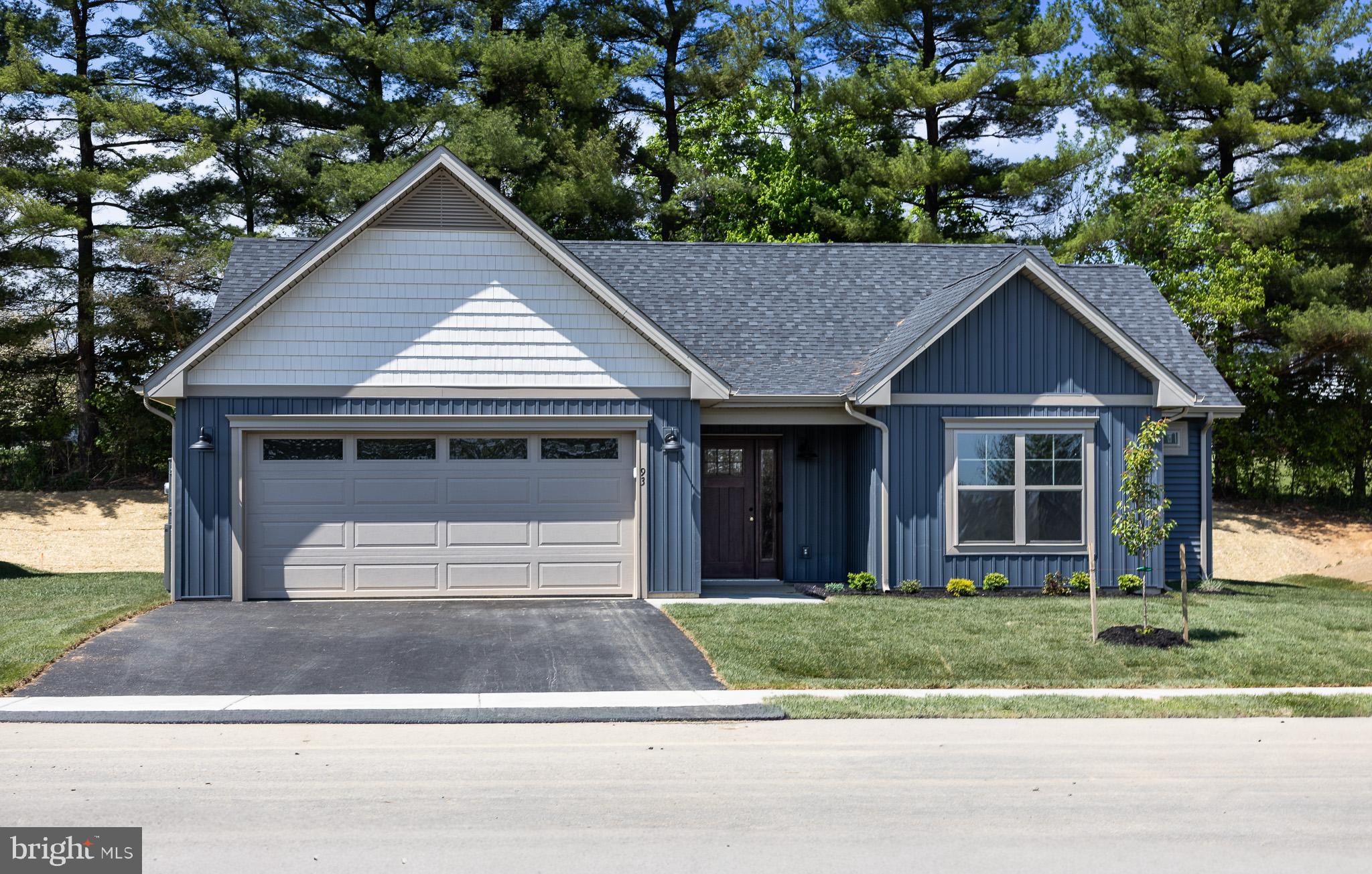 This new construction home is NOW READY for move in, in the new community of Meadow Crest – by Panhandle Homes of Berkeley County.  Located in the Spring Mills community, Meadow Crest is a small neighborhood with sidewalks lining the street and views of trees.  This home backs to a tree line for additional privacy.  Built with low-maintenance in mind, this one level rancher comes with LVP throughout the main living areas, quartz countertops, an open kitchen with a large kitchen island, a step in tile shower in the owners suite and a large covered rear porch.  The home comes with a 1 year builders warranty, Trane HVAC system and public water/sewer with electric appliances.
