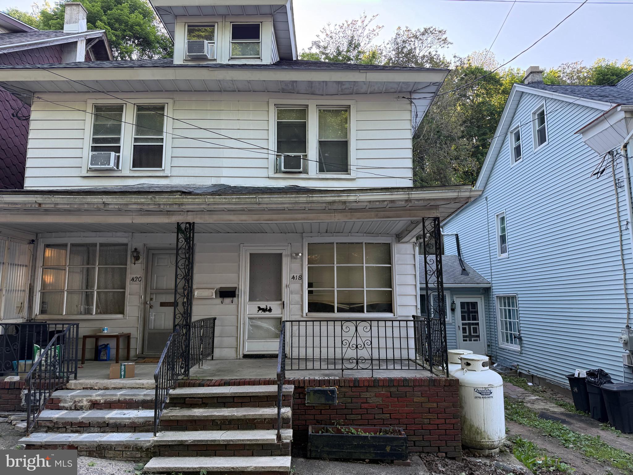 Value and potential await in this 3-bedroom, 1-bath Minersville twin home. The main floor features a front covered porch, a combination living and dining room, an eat-in kitchen, and a rear enclosed patio that opens to a small yard. The second floor offers three private bedrooms and a full bath, while the attic and basement provide additional storage space. Heated by propane, this property is packed with potential for investors or DIY buyers looking to build equity. The home is being sold strictly as-is, and cash or strong conventional financing is preferred. Bring your tools, bring your vision, and call today to schedule a showing.