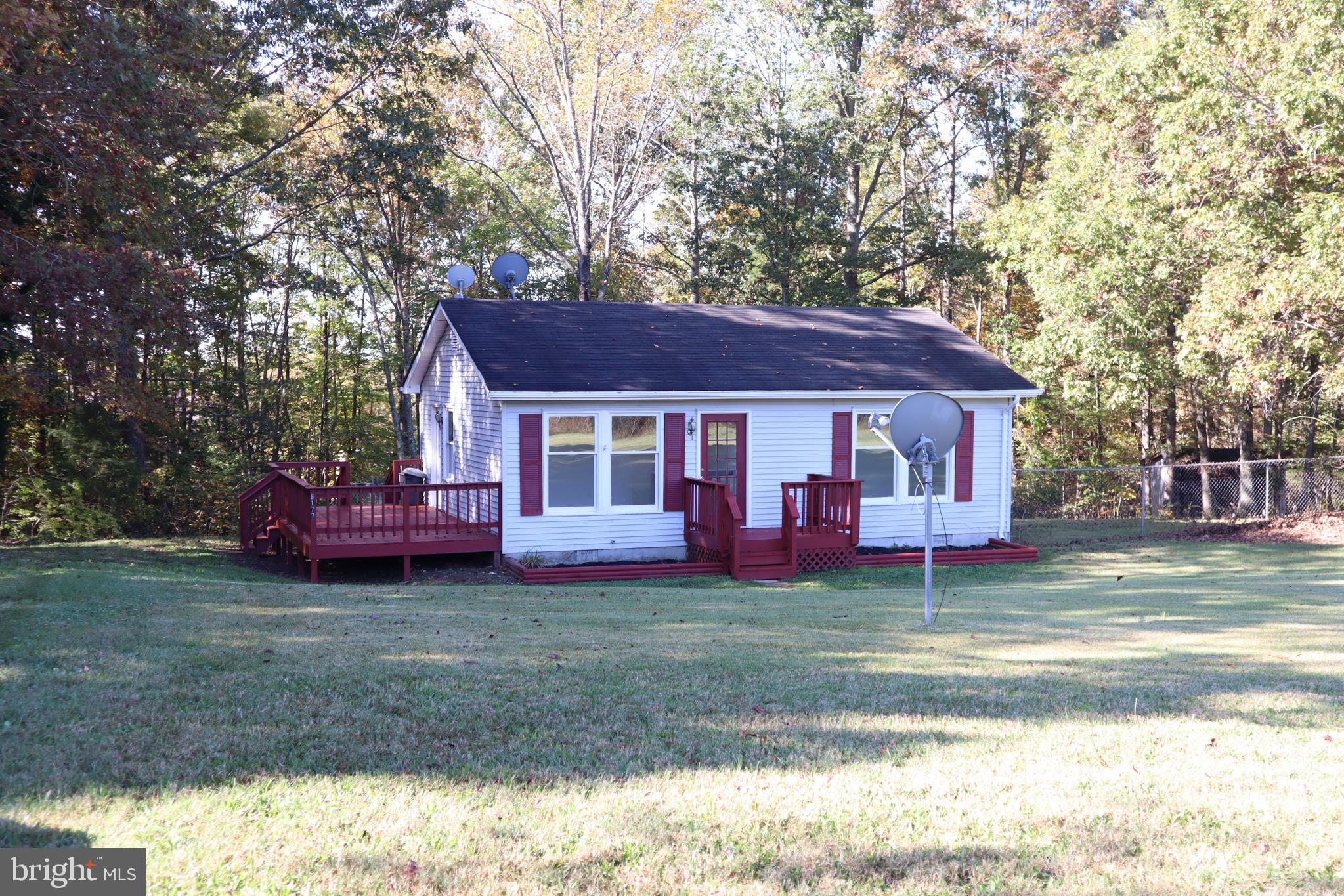 Tucked back, you will find this quaint Rambler that will not disappoint! You will enjoy all the cozy feels as this home offers an Eat-in-Kitchen, Family Room, Two Bedrooms and a Full Bath. The 1.97 acre lot offers mostly privacy with endless opportunities. Don't waste time and come see this beauty today!