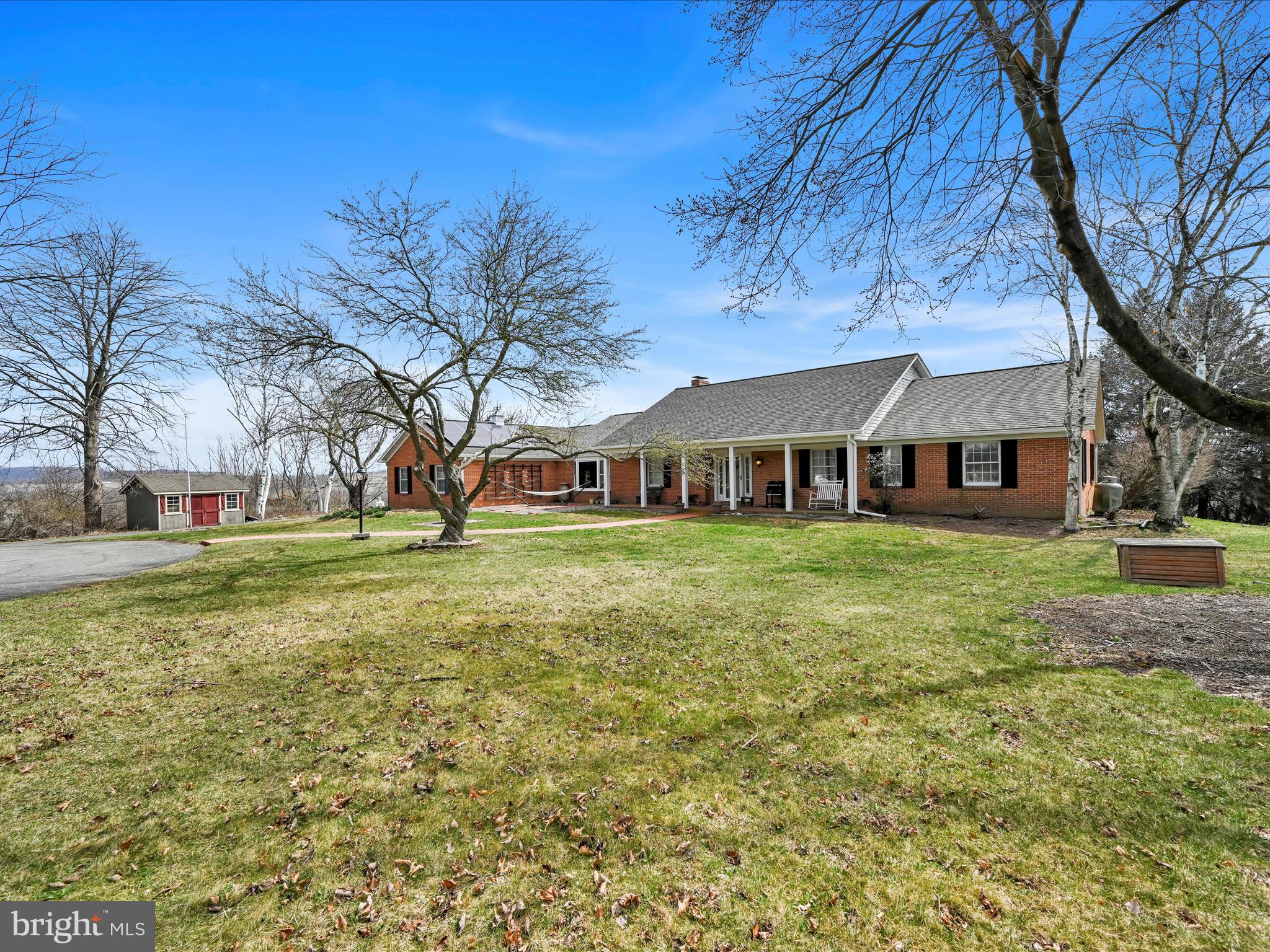 UPDATE: Multiple offers received - final and best offer deadline set for Tuesday 4/8/25 at 4pm.
Nestled on a peaceful cul-de-sac within the highly regarded Blue Mountain School District in Orwigsburg, this exceptional 4-bedroom, 3 full bath, 1 half bath residence offers over 3,800 square feet of living space on a sprawling 2.1-acre lot. Prepare to be captivated by the panoramic views that surround this remarkable property. The expansive layout features a bright and inviting living room, complete with a propane fireplace and custom built-ins, perfect for cozy gatherings. Hardwood and laminate floors flow throughout the home, adding warmth and sophistication. Enjoy formal meals in the elegant dining room, enhanced by a charming bow window. The well-appointed kitchen boasts a separate prep area, a walk-in pantry for ample storage, and a delightful breakfast nook where you can savor your morning coffee while soaking in the beautiful surroundings. The first floor features not one, but two bedrooms with private full baths, including the owner's suite with a dressing room area and bath with a walk-in shower. A dedicated first-floor study/office provides the perfect space for remote work or quiet reflection. The family room, complete with a fireplace, offers a comfortable space for relaxation, while the all-season/game room, with its distinctive wood and brick-paneled walls, is ready for entertainment and recreation. The home also includes a convenient guest powder room off the two-story open foyer and first-floor laundry space.  A partially finished 900+ square foot basement offers additional recreational space and ample storage. Step outside to the expansive rear wrap-around deck, designed for ultimate privacy and relaxation. The oversized 2-car garage provides ample parking and storage, with convenient interior access via the mud room. The 2.1-acre lot offers plenty of space to enjoy the tranquility and breathtaking panoramic views. This home offers a rare combination of space, comfort, and stunning natural beauty. Don't miss the opportunity to make it yours!