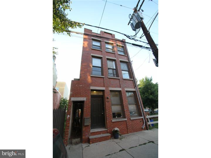Welcome to this stunning and modern 4 bedroom, 2 bath home that was expertly renovated in 2005. Property located in rapidly developing South Kensington and is a stones throw from Northern Liberties, the Piazza, Taco Riendo, Crane Arts building and all the great restaurants in the area. Step into the first floor into the open grand living room and dining room, refinished hardwood flooring and plenty of room to entertain.  Kitchen is expansive and modern with high end cabinets, counter-top and stainless steel appliances.  The kitchen leads out to a nice patio area for grill and table with chairs, perfect for summer bbq and/or pets.   Take the stairs up to the second level that has two large bedrooms, laundry and shared bath. Third floor is expansive master bedroom suite complete with full bathroom. Don't miss out on touring the deck with amazing city views off of the master suite.   All mechanicals updated in 2005.  Roof has 2-year warranty.  Great comps in the area and new construction in every direction.  This is a must see and easy to show !