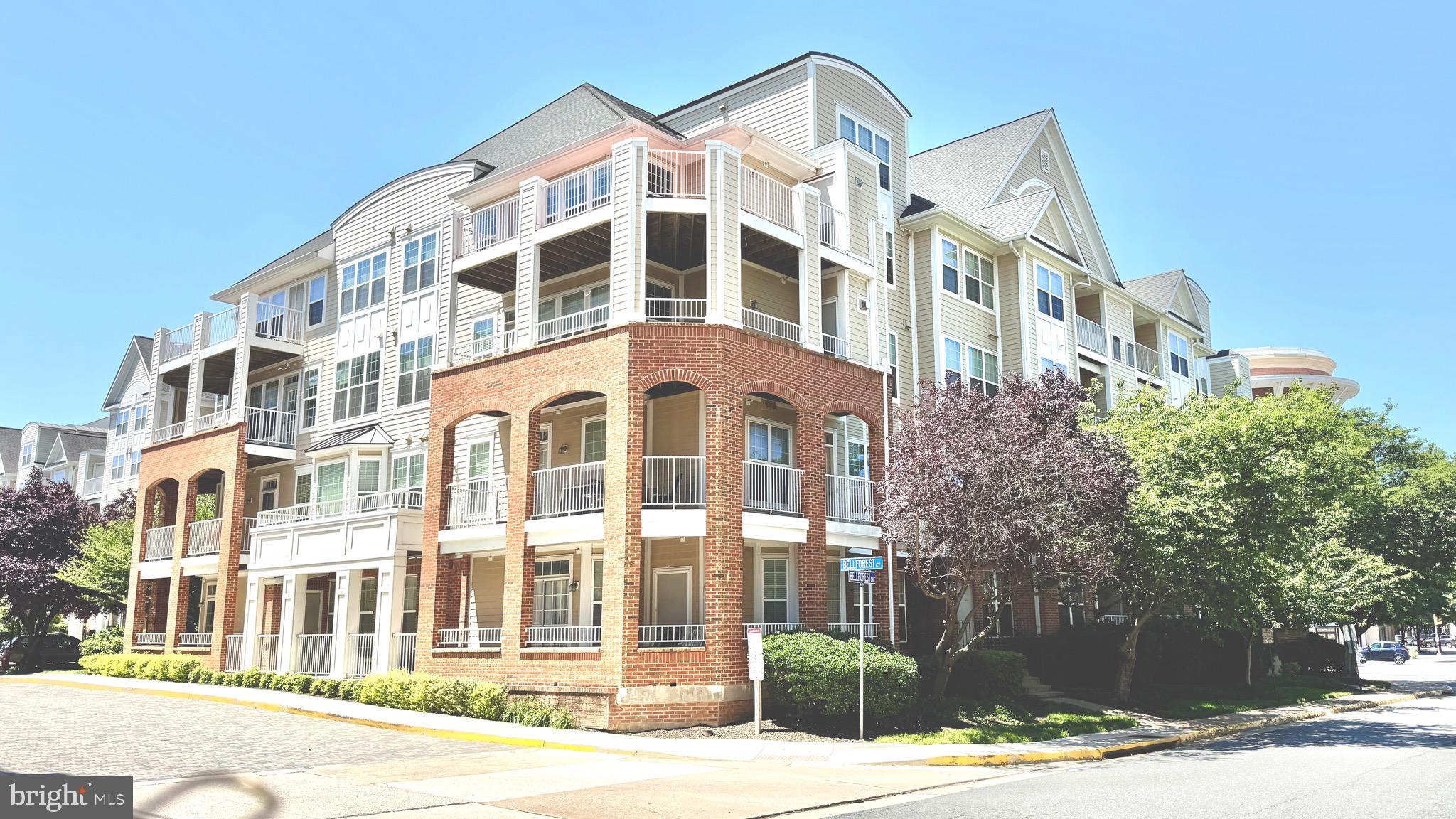 Welcome to Westbriar, where townhome-style living meets the ease of condominium ownership. This beautifully updated 2-level, 2-bedroom, 2.5-bath residence offers a bright, open layout filled with natural light from oversized windows. The main level features luxury vinyl plank flooring, fresh paint (2025), updated lighting (2025), a cozy gas fireplace, and seamless living and dining spaces designed for comfortable everyday living and effortless entertaining.

The refreshed white kitchen showcases brand-new quartz countertops (2025), a new GE gas range (2025), a new refrigerator (2025), abundant cabinetry, and generous workspace. Upstairs, the spacious primary suite includes a walk-in closet and a spa-inspired bath with dual vanities, a soaking tub, and separate shower. A second en-suite bedroom, upper-level laundry room, and ample storage add to the home's functionality.

Enjoy two private balconies, two side-by-side garage parking spaces, and a large private storage unit. Residents also enjoy access to a swimming pool, fitness center, clubhouse, and party room.

Ideally located directly across from the Dunn Loring–Merrifield Metro and moments from the Mosaic District, this home offers unparalleled access to shopping, dining, entertainment, and major commuter routes. Harris Teeter, coffee shops, restaurants, Tysons Corner, INOVA Fairfax Hospital, and the W&OD Trail are all nearby, with easy access to I-495, I-66, Route 50, Route 29, and Route 267.

A rare opportunity to enjoy stylish, low-maintenance living in one of Northern Virginia's most desirable and walkable communities.