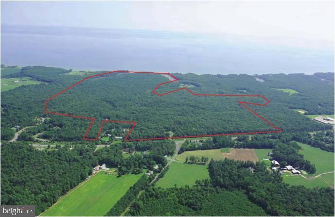 RARE OPPORTUNITY - 390 ACRES - CHESAPEAKE BAY WATERFRONT: Sale Includes Two (2) Parcels Consisting of 390 Acres +/- of Wooded Land w/ Approx. 1000 LF of Waterfront and Expansive Views. Potential of Eight (8) Building Lots, Marketable Timber or Incredible Hunting, Fishing and Recreational Land with Deer and Turkey.  Property also Affords 2,000 LF of Road Frontage Along Three Notch Road (MD Route 235) and Only Minutes from Patuxent River Naval Air Station. Zoning is Residential Preservation or Residential Preservation - Open Space. Property is also Subject to Restrictions from Maryland Environmental Trust (MET) Easements. Showings By Appointment Only!
