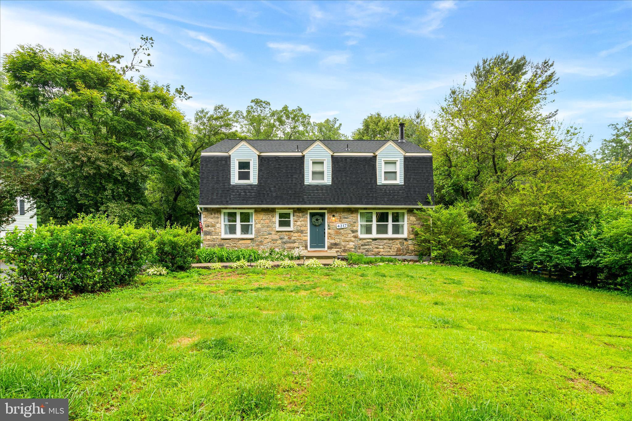 Open House Sunday 5/31 12PM-2PM! Welcome home to 4217 Bill Moxley Road, a beautifully renovated colonial perfectly situated on the highly desirable Frederick County side of Mount Airy. Nestled on a private 0.80-acre wooded lot, this move-in ready home offers the perfect combination of timeless charm, modern updates, and peaceful outdoor living. Thoughtfully updated from top to bottom, this exceptional property showcases true pride of ownership and quality craftsmanship throughout. Step inside to discover a bright and inviting interior featuring refinished hardwood flooring, fresh paint, abundant natural light, and an ideal flowing floorplan designed for both everyday living and entertaining. The completely renovated gourmet kitchen is the heart of the home, boasting stylish cabinetry, quartz countertops, modern finishes, and ample prep and storage space. The spacious living areas provide warmth and functionality, while the sunroom offers the perfect bonus space for relaxing, entertaining, or enjoying the surrounding natural views year-round. Upstairs, you’ll find 4 generously sized bedrooms and beautifully updated bathrooms designed with comfort and style in mind. The fully finished walkout basement expands the home’s living space even further, featuring luxury vinyl plank flooring and endless flexibility for recreation, a home office, gym, or guest accommodations. Major recent updates include a new roof, new HVAC system, new water heater, updated kitchen, renovated bathrooms, and a fully finished basement, allowing for true turnkey living. Conveniently located near commuter routes, shopping, dining, parks, and all that downtown Mount Airy has to offer, this property provides the perfect balance of privacy, convenience, and modern comfort.