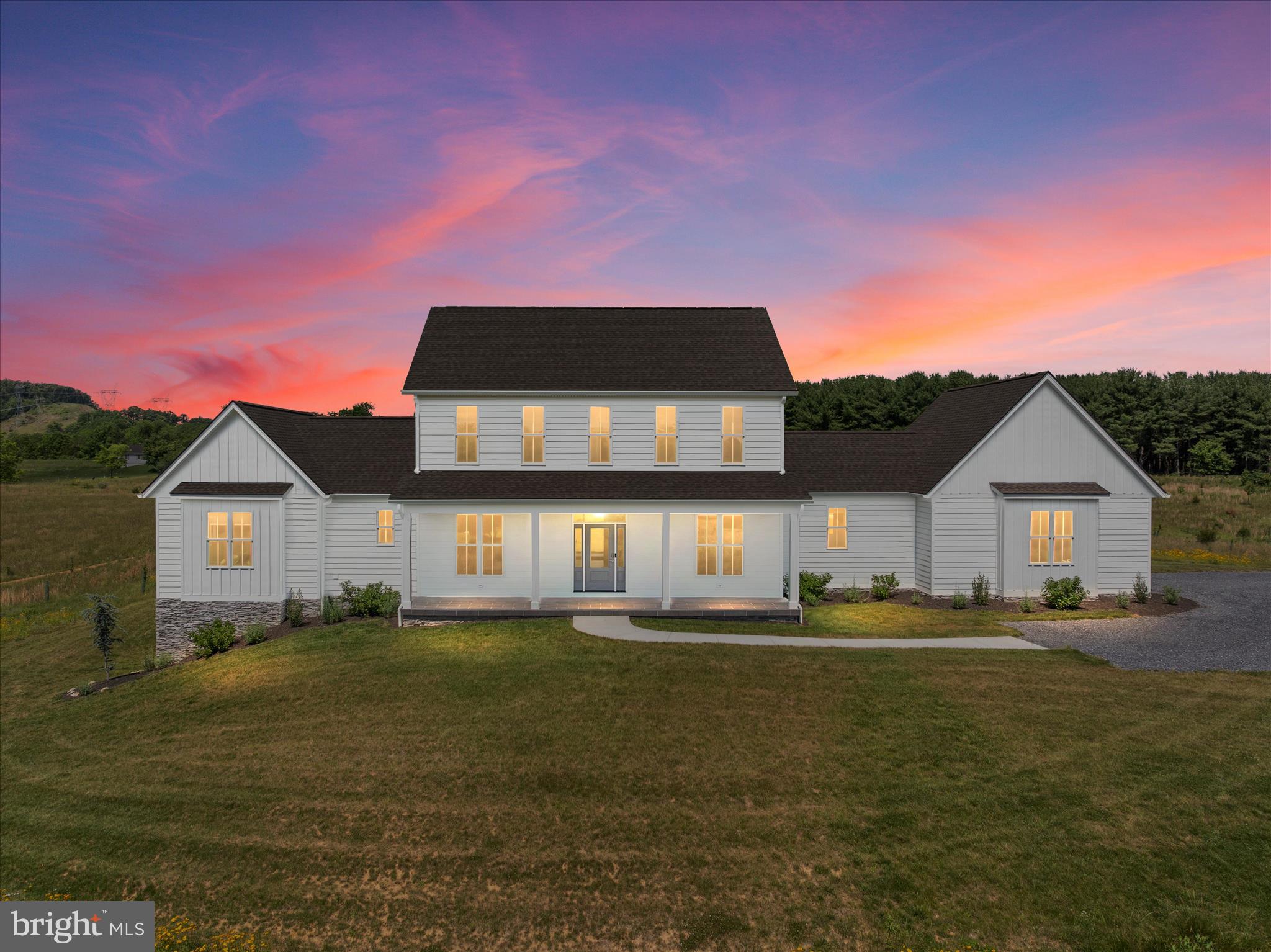 Modern farmhouse living meets peaceful acreage on 2.75 acres right on Cedar Creek Grade. Built just two years ago by owner/builder Stephen Carroll, this thoughtfully designed home offers main-level living, scenic hilltop views, a walkout basement, high-speed fiber-optic internet, and a peaceful outdoor setting complete with a koi pond, wildflower meadow, and 275+ trees planted around the property.

Inside, the home features a bright, open layout with gray solid oak floors throughout the main level, 9-foot ceilings on all levels, Andersen windows, and clean modern finishes. The main level includes the owner suite, an additional bedroom, spacious laundry room, and walk-in pantry, creating convenient one-level living without sacrificing space. The kitchen offers white shaker cabinetry, quartz countertops, and a fresh modern design that flows easily into the main living areas. The upper level has a large bonus room, a dedicated home office and two additional large bedrooms with tiled bath.

Outdoor living is a major highlight, with an 18x18 covered rear patio finished with porcelain tile overlooking the backyard. The 10x12 koi pond with waterfall and stream creates a relaxing retreat, while the roughly 20x30 vegetable garden area with water hydrant and electrical outlet. 

The home also features 2x6 exterior walls, dual-level 15 SEER Heil heat pumps, a heat pump water heater, and an EV receptacle, adding efficiency and long-term value. The 24x24 two-car garage includes additional bump-out space, and the large unfinished window-lit walkout basement offers incredible potential with bathroom rough-in already in place. Whether you envision more finished living space, a home gym, media room, workshop, or guest area, the lower level is ready for your plans.  All on a 4-bedroom conventional gravity septic system. 

With scenic views, modern comfort, thoughtful construction, and easy access just minutes from Route 37, this property offers the rare combination of peaceful country living and everyday convenience.