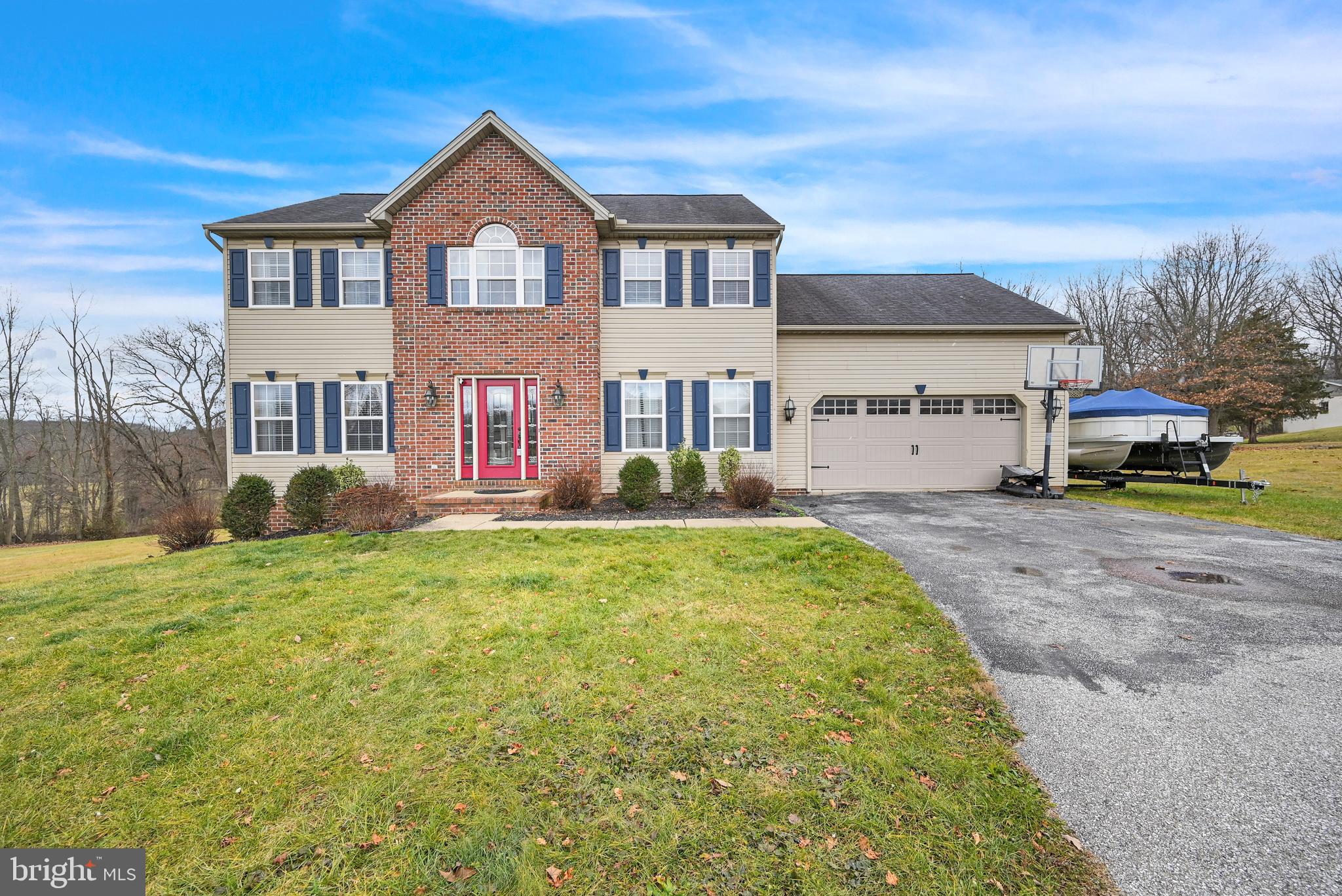 YOU'VE GOTTA SEE THIS INCREDIBLE HOME* FROM THE MOMENT YOU PULL UP YOU'LL FIND THIS IMPRESSIVE HOME SITUATED ON 1.53 ACRES IN A CUL-DE-SAC WITH AN ABUNDANCE OF PRIVACY BACKING TO TREES AND A MILLION DOLLAR VIEW OF LAKE CODORUS* UPON ENTERING YOUR GREETED BY A SPECTACULAR MODERN FARMHOUSE STAIRCASE.  THE 1ST FLOOR HAS BEEN RENOVATED & CONSISTS OF A SITTING ROOM (POTENTIAL OFFICE), FORMAL DINING ROOM, 1ST FLR LAUNDRY & AN OPEN FAMILY ROOM & KITCHEN.  THE KITCHEN IS COMPLIMENTED W/GRANITE COUNTER TOPS, PROFESSIONALLY PAINTED CABINETS W/UPGRADED HARDWARE & HIGH END APPLIANCES* YOU'LL LOVE THE LUXURY WIDE PLANK FLOORING.  THE FAMILY ROOM HAS AN AWESOME SHIP LAP WALL & YOU'LL BE IN AWE OF THE VIEW OF CODORUS LAKE IN EVERY SEASON RIGHT FROM THE COMFORT OF YOUR OWN LIVING ROOM* THE 2ND FLOOR HAS 4 BEDROOMS (THERE IS A 5TH BONUS ROOM WHICH COULD BE A BEDROOM, HOWEVER, THIS ROOM HAS A WINDOW A/C & ELECTRIC HEATER - CURRENTLY USED AS A STORAGE ROOM).  THE OWNERS SUITE OFFERS CATHEDRAL CEILINGS  & THE SAME SPECTACULAR VIEW OF CODORUS LAKE PLUS A PRIVATE BATH W/ LARGE WALK-IN CLOSET.  ALL THE BEDROOMS ARE GENEROUS IN SIZE. THE LOWER LEVEL IS  PERFECT FOR SPORTING EVENTS & MOVIES COMPLIMENTED W/4 THEATRE CHAIRS, PROJECTOR & SCREEN (INCLUDED) & ALSO A SPORTS BAR & HALF BATH.  THERE IS A WALK-OUT & PLENTY OF ROOM FOR STORAGE*  THE OUTSIDE SPEAKS FOR ITSELF...THE DECK IS OFF THE KITCHEN OVERLOOKING THE ABOVE GROUND POOL & YOU'LL RELAX & ENJOY NATURE AT ITS FINEST & YET AGAIN THE TRANQUIL VIEWS ARE BREATHTRAKING IN ALL SEASONS...COME SEE FOR YOURSELF.