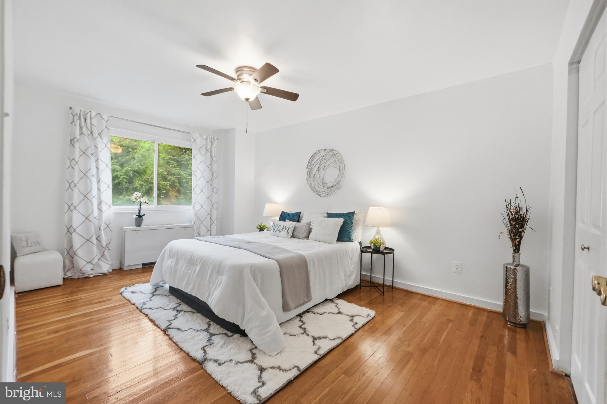 Your sunny retreat in the heart of Takoma Park! Located on the third floor, this VA-APPROVED CONDO offers a perfect blend of modern convenience and classic charm, with NO PARKING LOT VIEWS - just peaceful, tree-top vistas. The open-concept layout immediately welcomes you with GLEAMING HARDWOOD FLOORS and large windows that flood the living and dining areas with ABUNDANT NATURAL LIGHT. The kitchen is a chef’s delight, featuring premium GRANITE COUNTERTOPS, STAINLESS STEEL APPLIANCES, and a BRAND NEW OVER-THE-OVEN MICROWAVE (2026). A bright kitchen window frames lovely views, while the convenient pass-through breakfast bar makes entertaining a breeze. Additional updates include a NEW KITCHEN FLOOR (2026) and a professionally UPGRADED BEDROOM CLOSET (2025) with custom organization, complementing the generous storage found throughout the unit, including a large hallway closet and cooling ceiling fans.

Step outside and enjoy UNBEATABLE WALKABILITY. You are just steps from the Takoma Park Metro, the popular Sunday Farmers Market, and Sligo Creek Park. Enjoy local favorites right at your doorstep, including the TPSS Co-op, Soko Butcher, Cielo Rojo, Busboys and Poets, Takoma Bev Co, and Old Takoma Ace Hardware. This pet-friendly, vibrant community truly offers the best of urban-suburban living!
