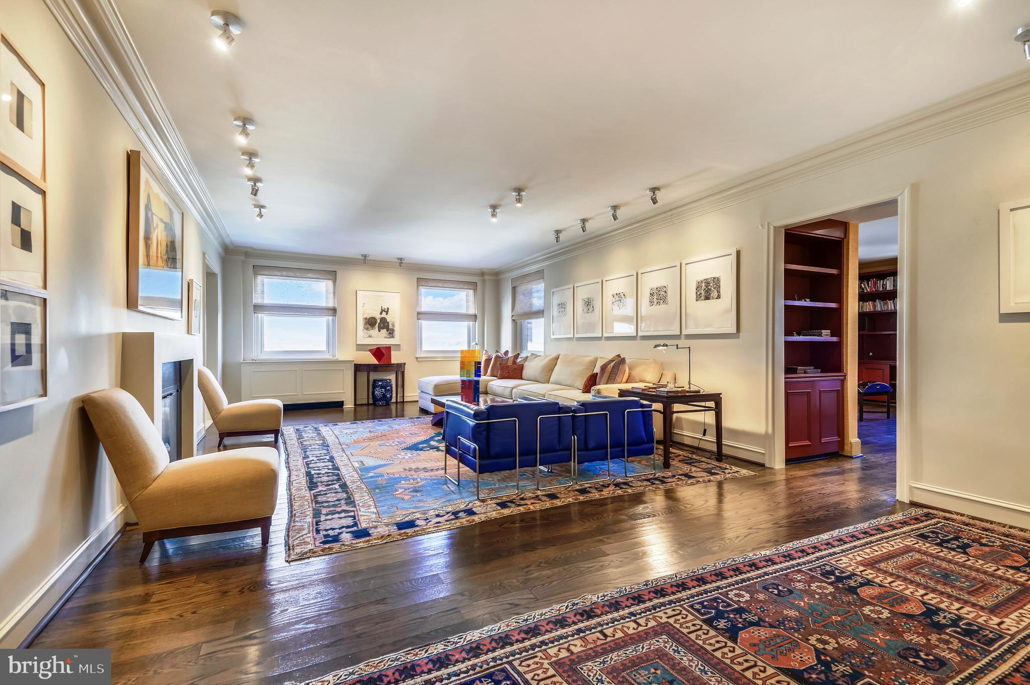 Listed and sold simultaneously. Come view this elegant two bedroom & den condominium on the 10th floor of the full service Warrington Condominium w/ 3025 sq ft featuring high ceilings, good natural light, decorative molding + north, east & west views --- An updated eat-in kitchen w/ bamboo flooring; a SS 4 burner gas cooktop; granite countertops; a SS dishwasher, microwave, wall oven & warming oven + a Sub-Zero refrigerator & extensive cabinet storage --- A 28’ living rm w/ oak flooring & crown molding --- An oversized dining room w/ marble flooring + a 19th century Baccarat chandelier --- A 23’ primary brm w/ walk-in closet and sliding doors to a spacious den --- Primary bath w/ marble tile walls, a whirlpool tub & shower stall + a 2nd large walk-in closet --- Built-in office area --- Great closet space throughout --- Wonderful proportions for entertaining --- Expansive art lighting --- All 21 double-hung windows replaced in the last 4 years --- Additional storage, an exercise rm, wine storage space all on the ground floor + 2 deeded parking spaces including valet parking round out this exceptional offering.