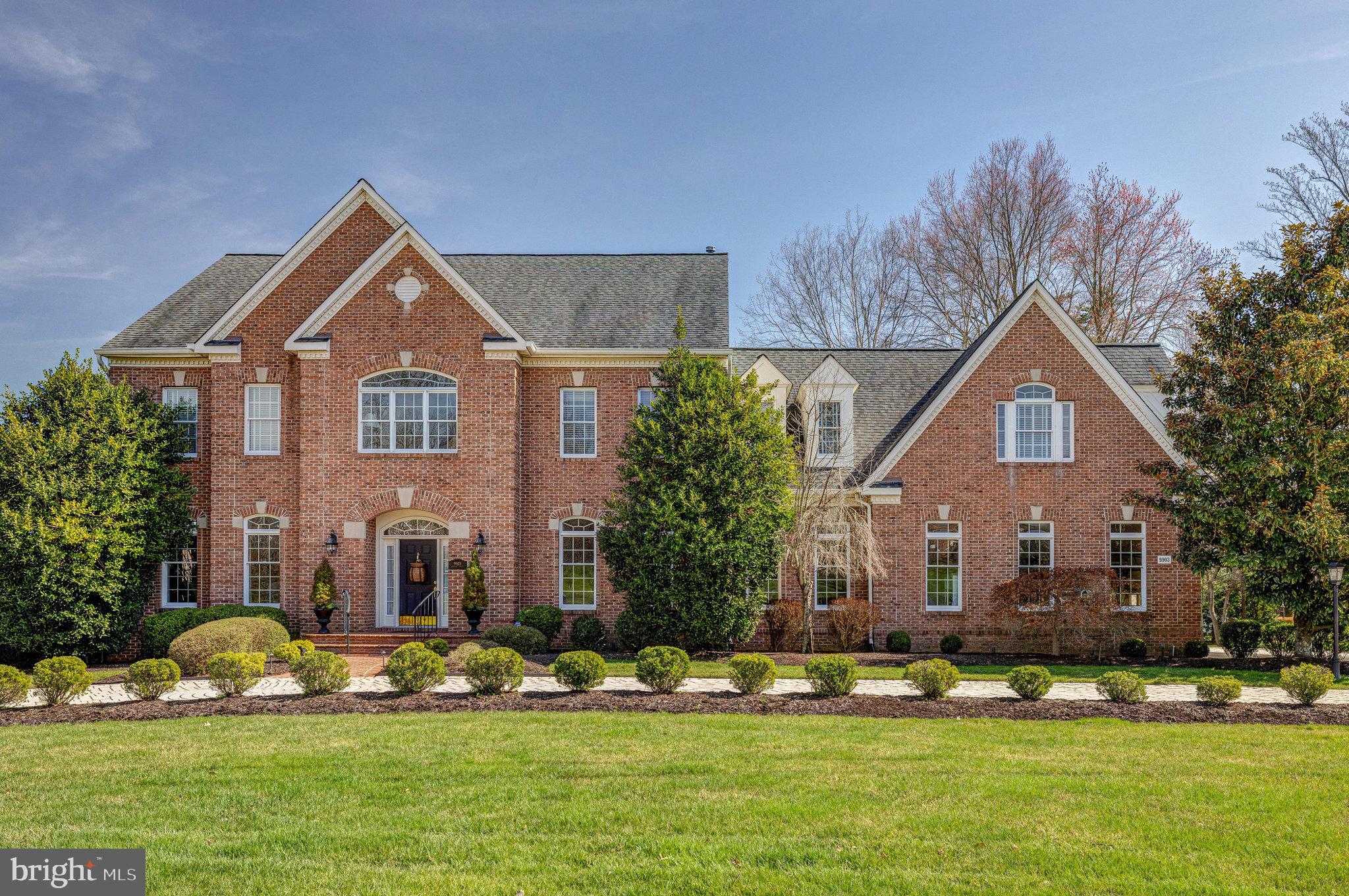 Welcome home to this luxurious, turnkey, brick residence within the beautiful Colvin Mill Run neighborhood.  This 7,652 sq. ft home is located on a cul-de-sac with a paver circular driveway.  A beautifully landscaped brick walkway leads to a formal entrance that opens to a stunning two-story foyer with a grand staircase setting the stage for gracious entertaining in the formal dining, living room and sunroom areas. The flowing floorplan then connects these areas to the spacious family room and kitchen.
Open and bright by design, the family room offers a coffered ceiling, grand brick fireplace and built-in cabinets. Adjacent to the family room is the breakfast area and the gorgeous gourmet kitchen with island, well-appointed with high end appliances including a 5 burner Wolf gas cooktop and Thermador oven, microwave and warming drawer. Just a few steps away is a catering kitchen with a 2nd dishwasher, double sink and 2nd full size fridge. To complete the main level there are two powder rooms and a back-family staircase.
The upper level has a grand owner’s suite boasting a sitting room with fireplace, large walk-in closet and renovated luxury bathroom with dual vanity.  Additionally, there are 3 bedrooms, 1 ensuite and 2 with a shared renovated buddy bathroom.
The walk-out lower level is designed for entertaining and leisure with plenty of room inside and out for guests. Featuring 2 ensuite bedrooms, club room with fireplace, and pool room with full bar.
Additionally, there is an oversized 3 car garage, large deck off the casual dining space and lovely brick patio off the walk-out basement.