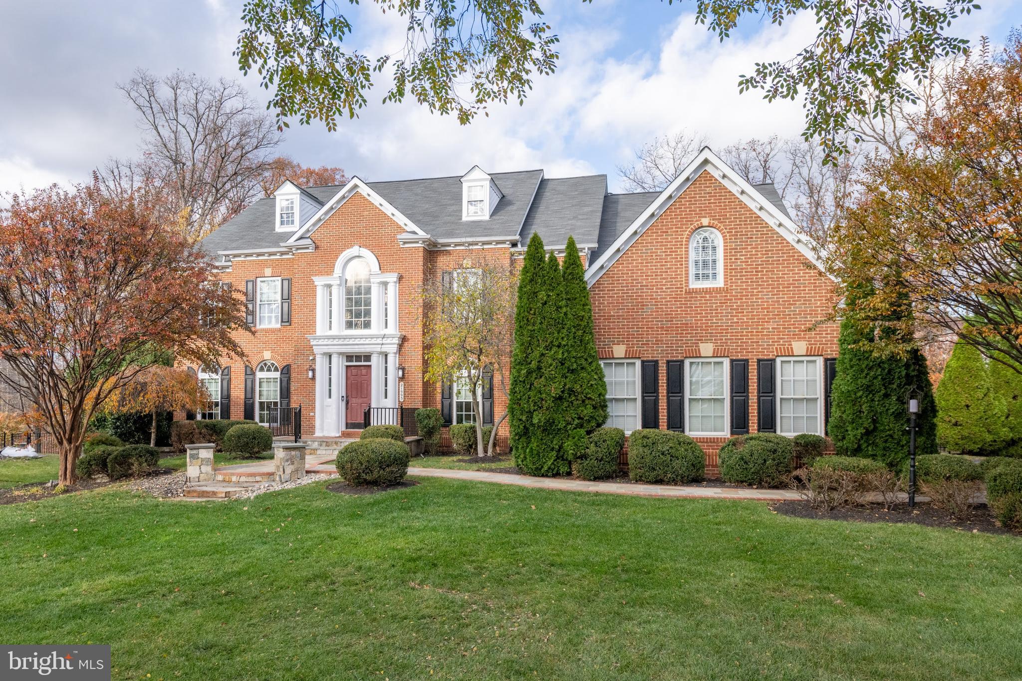 Stunning Custom Home with Luxury Features and Resort-Style Amenities

This exquisite custom home boasts unparalleled craftsmanship and an array of luxury features, perfect for entertaining and comfortable family living. From the grand entrance with custom stonework to the meticulously landscaped grounds, every detail has been thoughtfully designed for a sophisticated lifestyle.  3 car garage, half acre with unparalleled outdoor living with a pool.

Key Features:

Grand Entrance: Custom stonework creates a striking first impression.
Elegant Foyer: Capiz and crystal chandeliers illuminate the spacious foyer.
Custom Library: Featuring built-in cabinetry, file cabinets, shelves, and a convenient space for a printer and paper shredder.
Main Level: Hardwood floors throughout most of the main level, with brand-new carpeting in the family and guest rooms.
Accessible Features: Main-level bathroom with a handicap-accessible shower.
Gourmet Kitchen: An enormous space with top-of-the-line appliances including two Bosch dishwashers, a Viking griddle stove, a large island, a built-in pantry, and a butler's pantry—perfect for any culinary gathering.
Family Room: Floor-to-ceiling windows with pool views and a custom-built fireplace/media wall. The mantle is hand-hewn from a 19th-century Pennsylvania barn.
Sun Room: Expansive windows overlooking a mature, professionally landscaped yard.
Basement Retreat: Enjoy a built-in movie theater with an extra-large screen, beverage fridge, and full-size fridge/freezer. The basement also features a gym with specialty flooring, built-in cabinetry, a half bath, and ample storage space.
Primary Suite: A true retreat with a stoned linear gas fireplace, an enormous walk-in closet with custom built-ins, and a brand new, elegant primary bathroom featuring security drawers.
Outdoor Paradise: An oversized pool with an electric retractable cover, diving board, tanning shelf, and Aqualink Bluetooth-controlled lighting system. The custom stone jacuzzi fits 8, and the backyard includes a built-in stone kitchen with a gas grill and Big Green Egg, a stone table, a fire pit for up to 12 people, and extensive travertine patio space. Professionally landscaped and outdoor lighting.
Sports & Recreation: A built-in basketball hoop and additional tanning patio behind the pool provide endless fun, while the backyard features built-in speakers and a comprehensive lighting system.
Additional Features:
Five spacious bedrooms on the upper level.
Six full bathrooms plus a half bath in the basement's rec area.
Built-in storage, cabinetry, and additional refrigerators in both the garage and basement.
Freshly painted walls and epoxy flooring in the garage.
Black aluminum fencing and an underground sprinkler system around the entire property.
This extraordinary home offers the perfect blend of luxury, comfort, and functionality, with every amenity you could imagine. A must-see for those seeking elegance and convenience in a prime location near the Ashburn Metro station.