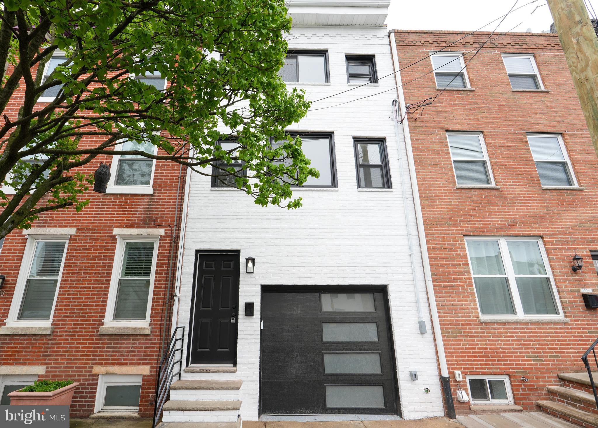 Discover this unique, one-of-a-kind property offering a minimalist lifestyle paired with modern amenities. Features include an attached garage with automatic door, central air, and an updated kitchen. Ideally located in Pennsport neighborhood, you will love the vibrant community feel where residents enjoy a blend of historic charm and modern growth, with walkable access to local eateries, green spaces, Delaware River waterfront, plus easy access to public transportation and major highways - making this home a perfect mix of style, comfort, and urban accessibility.