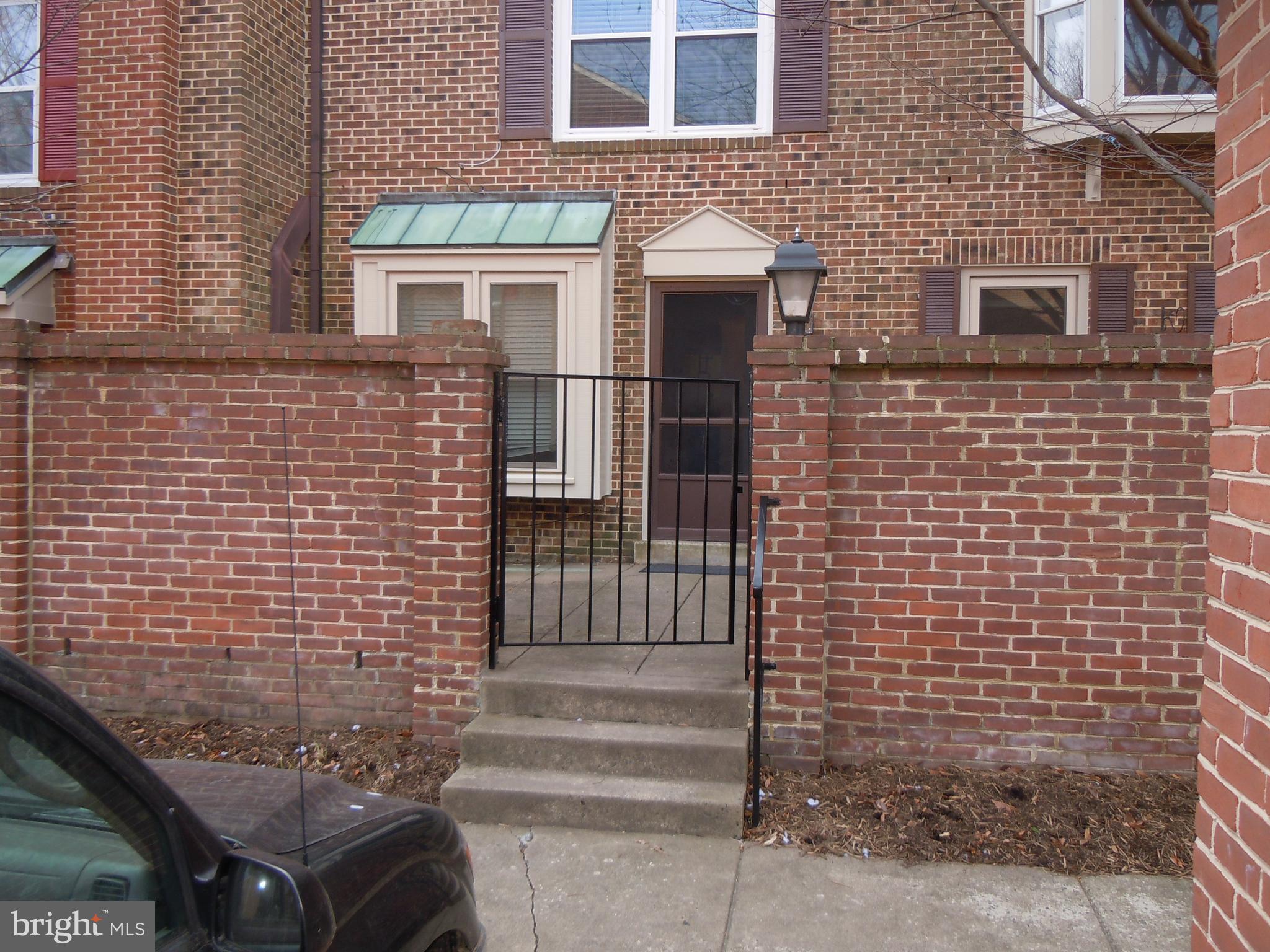 Rarely Available!   Fantastic Location!  Rare gem in the heart of Arlington!   One  Level  Condo - about 4 blocks from Ballston Metro!  This is 1120 "A".   The Front Door is around the rear (in the rear of the building)  -  Park in #17 and open iron gate into private patio.  You'll enjoy this private oasis.  Wonderful private outside yard / patio is space is great for entertaining and BBQ'g.  This condo offers large rooms and wood burning stove.  (these pictures are a few years old - as property is presently occupied).   Primary bedroom has private full bathroom.  Enjoy the full size washer & dryer;  and there's lot's of closet space.    This condo is near it all; metro, routes (I-495 & I-66), shopping, restaurants, Plenty of restaurants and nightlife within walking distance...  Water & Trash is already included in Condo Fee.   Rare Opportunity!  *