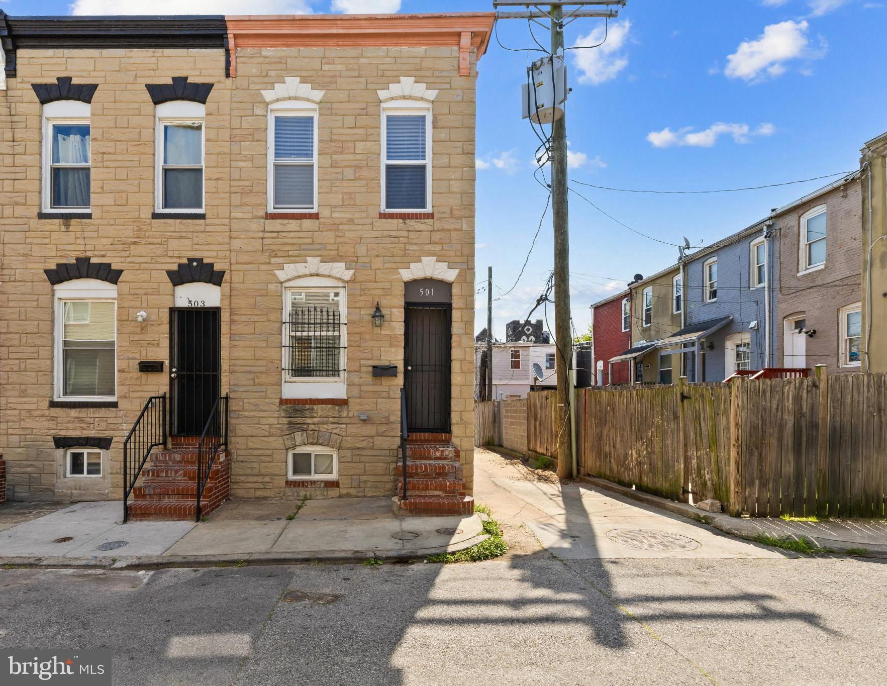 Welcome to this renovated end-of-group townhome in the heart of McElderry Park! This move-in ready home offers 3 spacious bedrooms, 2.5 bathrooms, and stylish updates throughout. The kitchen features brand-new stainless steel appliances, modern finishes, and ample cabinet space, flowing seamlessly into the main living areas with hardwood floors and fresh paint throughout. The fully finished lower level provides additional living space with a full bathroom and a flexible room perfect for a guest suite, home office, or recreation area. Major updates include a brand-new roof and a newly installed privacy fence, offering peace of mind and outdoor enjoyment. Conveniently located just minutes from Johns Hopkins Hospital, downtown Baltimore, major commuter routes, parks, restaurants, and shopping. This exceptional renovation combines modern comfort with unbeatable value—schedule your showing today!