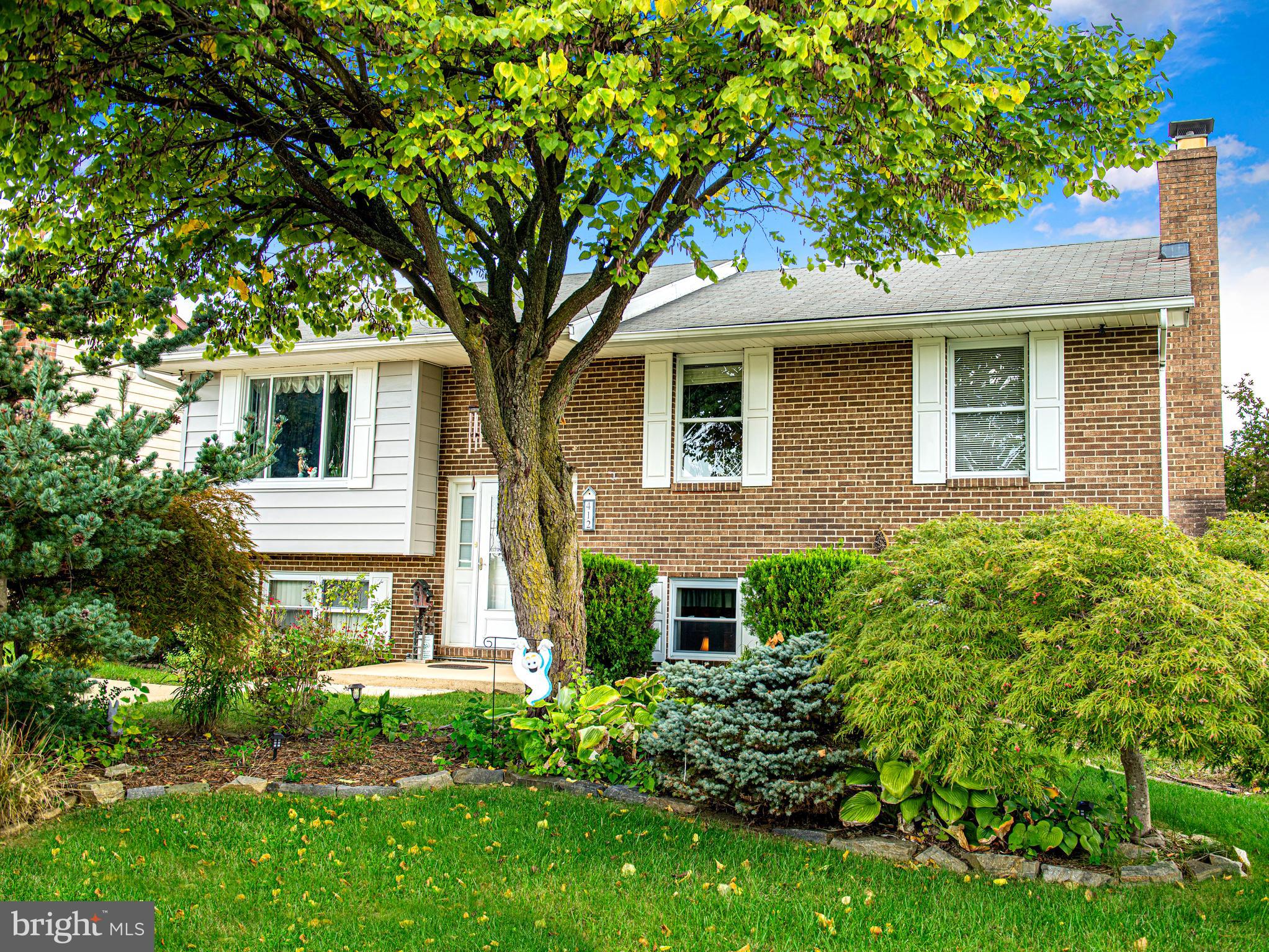 NEW PRICE!!  LOOK NO FURTHER:  Beautiful Brick Front Split with 2  composite decks, sun room and covered patio for relaxed outdoor living.  Cathedral ceilings, masonry fireplace in oversized clubroom.  Beautifully appointed Living Room, Dining Room and Kitchen with new Appliances.  3 Bedrooms with an updated main bathroom and second bathroom in the lower level.  Across the street from open space, playing fields and courts.  Move in condition.