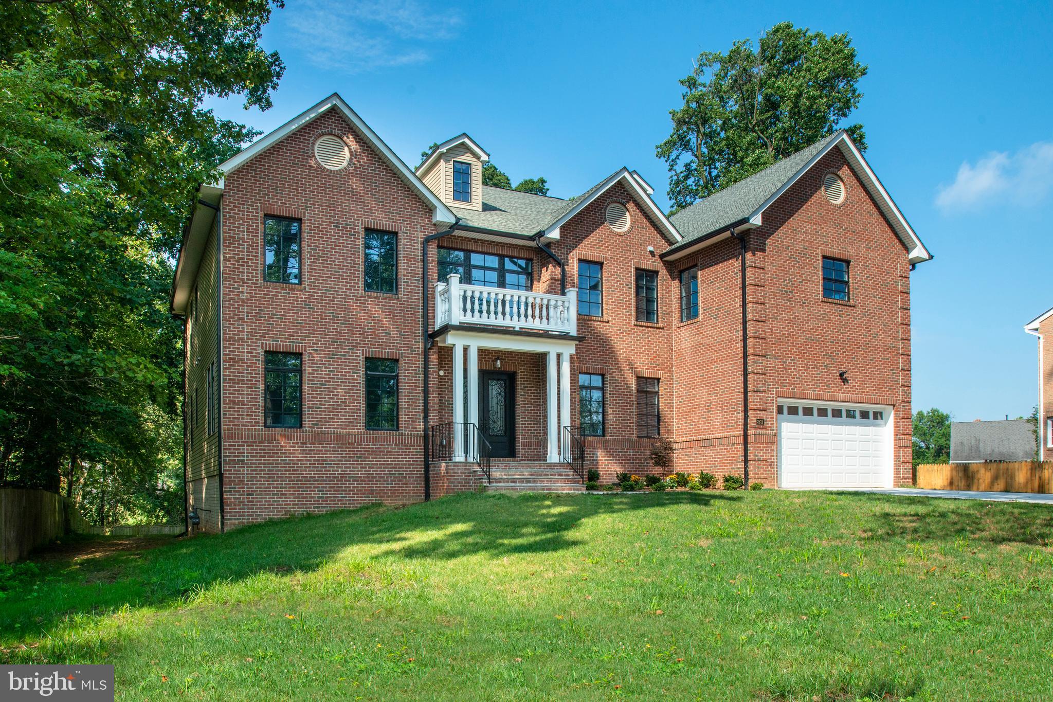 Stunning new Luxury Home in Falls Church sited on just over a 1/2 acre lot and located in the Haycock ES/Longfellow MS/McLean HS School Pyramid.  With over  7,000 finished sqft on 3 levels, this  6 bedroom  7.5 bath home features many luxurious amenities.  Beautiful Brazilian hardwood floors throughout main and upper levels.  The main level boasts an open floor plan, gourmet kitchen with quartz countertops, graciously sized living and dining rooms,  large family room with gas fireplace walking out to a large deck overlooking the backyard.  Perfectly sized Flex room with full bath just off the family room  complete the main level.  The upper level boasts large master bedroom with sitting area, two walk in closets and grand spa like bath; 4 generously sized bedrooms, all ensuite; and laundry room.  The lower level is perfect for everyday living and entertaining. Room for a theater, gym or extra bedroom make this perfect for any family.  Minutes to both East and West Falls Church Metro stations, shopping and more.