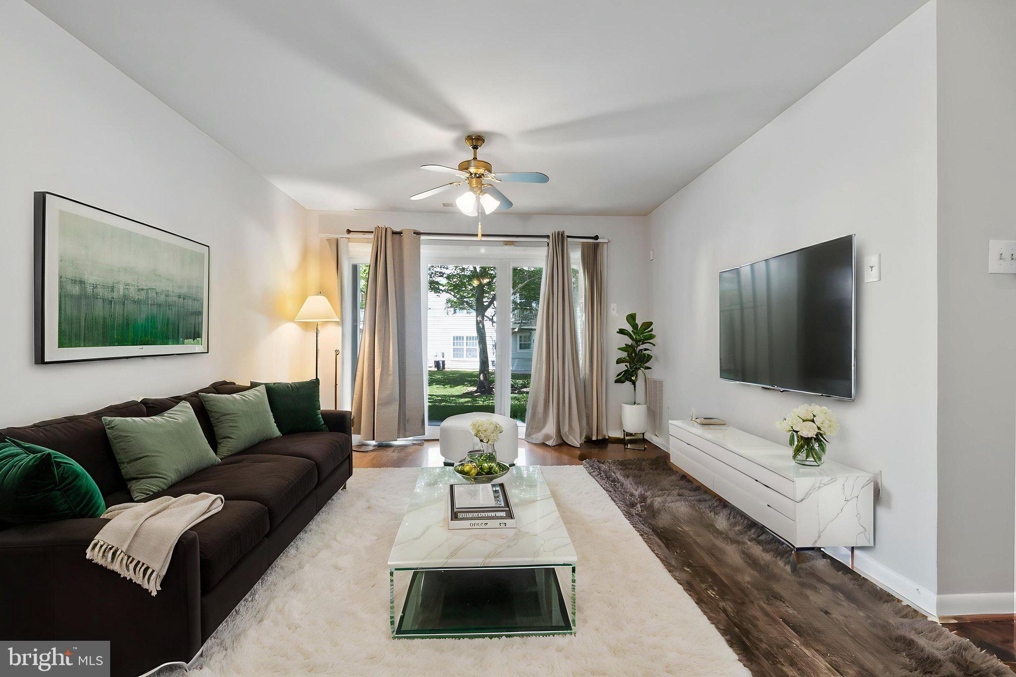 Welcome home to this spacious 2 bed, 2 full bath condo in the desirable Devon Hills community! This 1,175 sq ft ground-level unit features a roommate-style layout — perfect for buyers looking for privacy and functionality. Enjoy the open combination living/dining area, in-unit W/D hookup, and central A/C. The condo association covers exterior maintenance, insurance, parking, trash, snow removal, and more — truly low-maintenance living! Community amenities include a community center, jogging/walking paths, bike trails, picnic area, and tot lots. Conventional financing only. Don't miss this one!