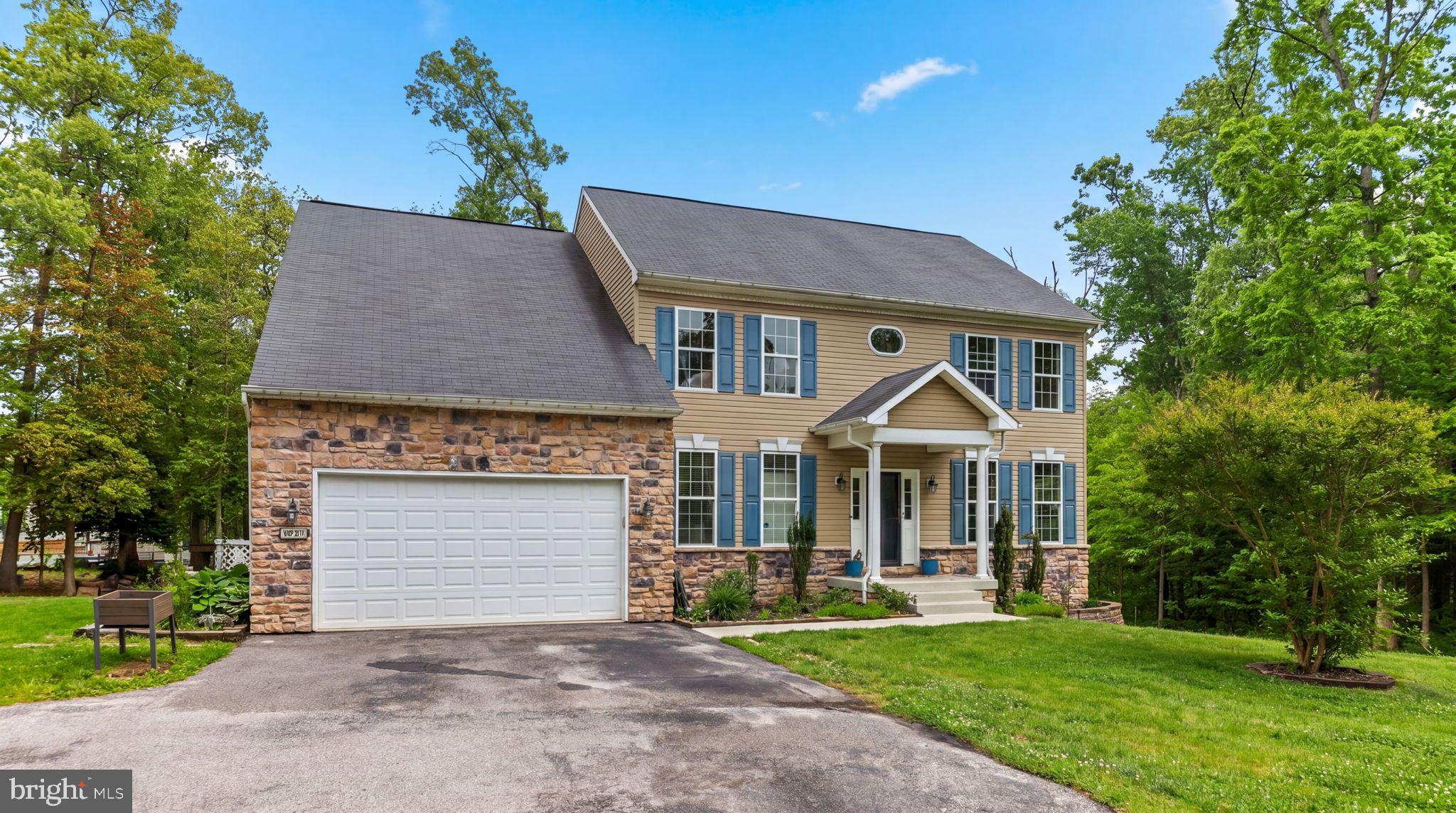If you're looking for lots of personal space and water privileges in Anne Arundel County, look no further. This 7 bedroom, 4.5 bathroom home in the sought after Chelsea Beach community, is situated on 1.07 acres, complete with a chicken coop and is ready for you to call it home. 
The first floor layout flows beautifully with plenty of flex space to suite your needs- playroom, homework room, home office or 2? The options are endless. The gourmet kitchen features granite counters, stainless steel appliances, and an island with seating, plus space for a kitchen table.  Off the kitchen are separate dining and living rooms, a mudroom leading to the 2 car garage, and access to the expansive deck and backyard. There's even a leveled out and rubber mulched space, ready for a playground.
Upstairs each of the 5 bedrooms are spacious and 3 full bathrooms give everyone plenty of space to breathe. Enjoy your own private oasis, because the large primary suite includes a 2 sided walk in closet, a soaking tub, stand alone shower, 2 sinks, and a separate toilet room. There are laundry hookups on each level, so pick your favorite spot or have multiple! 
But wait there's more! The finished basement includes 2 bedrooms and full bathroom, with plenty of extra space to relax, play, and/or exercise.  And your Chelsea Beach neighborhood has boat ramps, a fishing hole, playground, and nature trail! Association fee is optional.
Book your showing today and see all this beautiful and well maintained home has to offer.