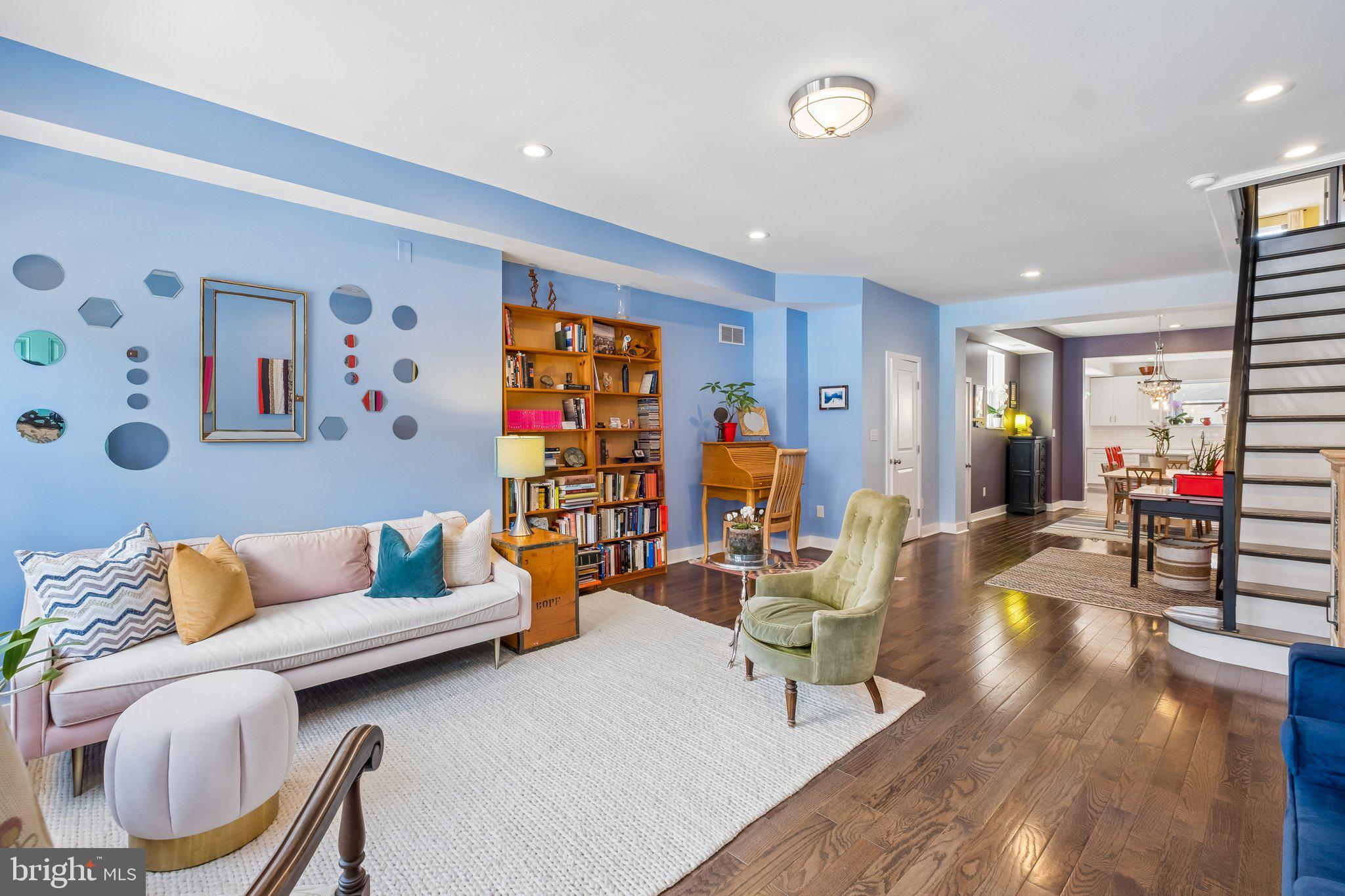Welcome to this immaculate, fully renovated rowhome on a well-maintained block in Newbold. Bright, spacious, and thoughtfully redesigned, this home offers an impressive 16 ft wide footprint and nearly 58 ft of depth, creating an open-concept living space that rivals larger homes in the neighborhood, and is truly perfect for entertaining. High ceilings, recessed lighting, and hardwood floors are showcased throughout, while windows along the alleyway flood the home with natural light.

The main level features a spacious living area, defined dining space, coat closet, powder room, and a beautifully appointed chef’s kitchen with crisp white cabinetry, sleek quartz countertops, a tiled backsplash, stainless steel appliances, a gas range, and an oversized island offering abundant prep space and seating. Upstairs, all three bedrooms are bright, generously proportioned, and offer ample closet space. The spacious primary suite overlooks the front of the home and includes a tiled ensuite bath with a walk-in shower. The two secondary bedrooms share a stylish full hall bath with a tub. A clean, unfinished basement spans the full length of the home and provides excellent storage space.

Ideally situated where Point Breeze meets East Passyunk, this home is steps away from neighborhood cafés and restaurants, the vibrant Passyunk Avenue corridor, and the Tasker-Morris station on the Broad Street Line, offering convenient access to Center City and beyond.