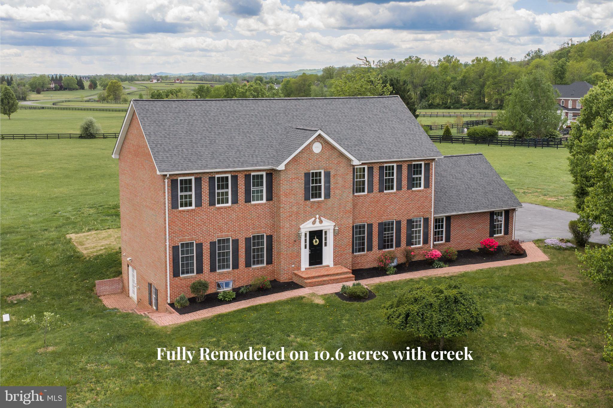 Leesburg home for sale on 10.62 acres in sought-after Lee's Crossing—where privacy, open space, and country living come together just minutes from downtown Leesburg, VA. This exceptional property offers the rare combination of usable acreage, scenic views, and a peaceful setting—perfect for those dreaming of space for a pool, outdoor entertaining, or simply room to breathe and relax.
For equestrian enthusiasts, this is a standout opportunity. Located in one of the few horse-friendly communities in the Leesburg area, the neighborhood is thoughtfully designed with equestrian living in mind, offering access to approximately 3 miles of riding trails. . Just minutes away, Morven Park provides even more miles of trails and hosts world-class equestrian events. If you don’t have horse you will love the scenic views and tranquility.

Inside, the home has been completely remodeled and is move in ready. Enjoy a light-filled, comfortable layout with generously sized living and dining spaces and newly remodeled kitchen -with lighted top accent cabinets, quartz counters, a stone wall accent and a coffee bar. Enjoy holidays in the formal dining room with quartz countertop buffet cabinet. The main-level has a private office/ guest room.  The family room has a wood-burning fireplace that  creates a warm, inviting space to gather off the kitchen area. The living room allows for more space for a piano or a big sectional.  Refi

The updated kitchen includes a tile backsplash, double wall ovens, and an electric cooktop with downdraft, along with a main-level laundry room for convenience. A back staircase adds character and flow, while the upper-level loft provides the perfect loft work-from-home space filled with natural light.

Upstairs, the primary suite offers a beautifully remodeled bath (2026) with new flooring, vanities, lighting, and a relaxing soaking tub. Three additional spacious bedrooms and a hall bath with double vanitcomplete the upper level.

The walk-out lower level expands your living space with a bright, open recreation room ideal for movie nights or entertaining, plus a bonus room, full bath, and wet bar, perfect for guests or easily converted into a private suite or kitchenette. A large storage area and additional laundry hookup add even more flexibility. Step outside and experience what makes this property truly special. A tree-lined driveway sets the tone, leading to a home surrounded by open land, stunning pastoral views, and a stream along the property’s edge. The brick patio and spacious deck create the perfect setting for outdoor dining, entertaining, or simply enjoying the quiet beauty of the countryside. With over 10 acres, there is ample space for a horse barn, paddocks, gardens. Bring your chickens, goats, sheep, and horses- they are welcome.  

Recent updates top to bottom, HVAC (2020), plus an air scrubber and UV light system, refinished wood floors, an oversized garage with automatic opener. More recently updated items:
2023 New electrical panel,  Electric Car charger 240V EV in garage.
2024 kitchen remodel
2025 radon remediation system
2025 new hot water heater
2025 new well pressure tank
2026 Brand new water filtering system
All of this is ideally located just minutes from the heart of Leesburg, Lucketts, and major conveniences like Wegmans, Costco, and the Leesburg Outlets—while still offering a true escape to country living. Easy access to Route 7 and Route 15 makes commuting simple. This 750-acre community is enriched with gently rolling topography and is located in Virginia's lush Loudoun County landscape.  This community has scenic views of the Sugarloaf Mountain, the Catoctin Mountains and natural tree line borders.  Just five miles north of Leesburg, six miles from the Dulles Greenway, 25 minutes from Frederick, Maryland and 40 minutes from Washington DC.  
If you’ve been searching for acreage, privacy, and the lifestyle that comes with it, Don’t miss this rare opportunity in Leesburg