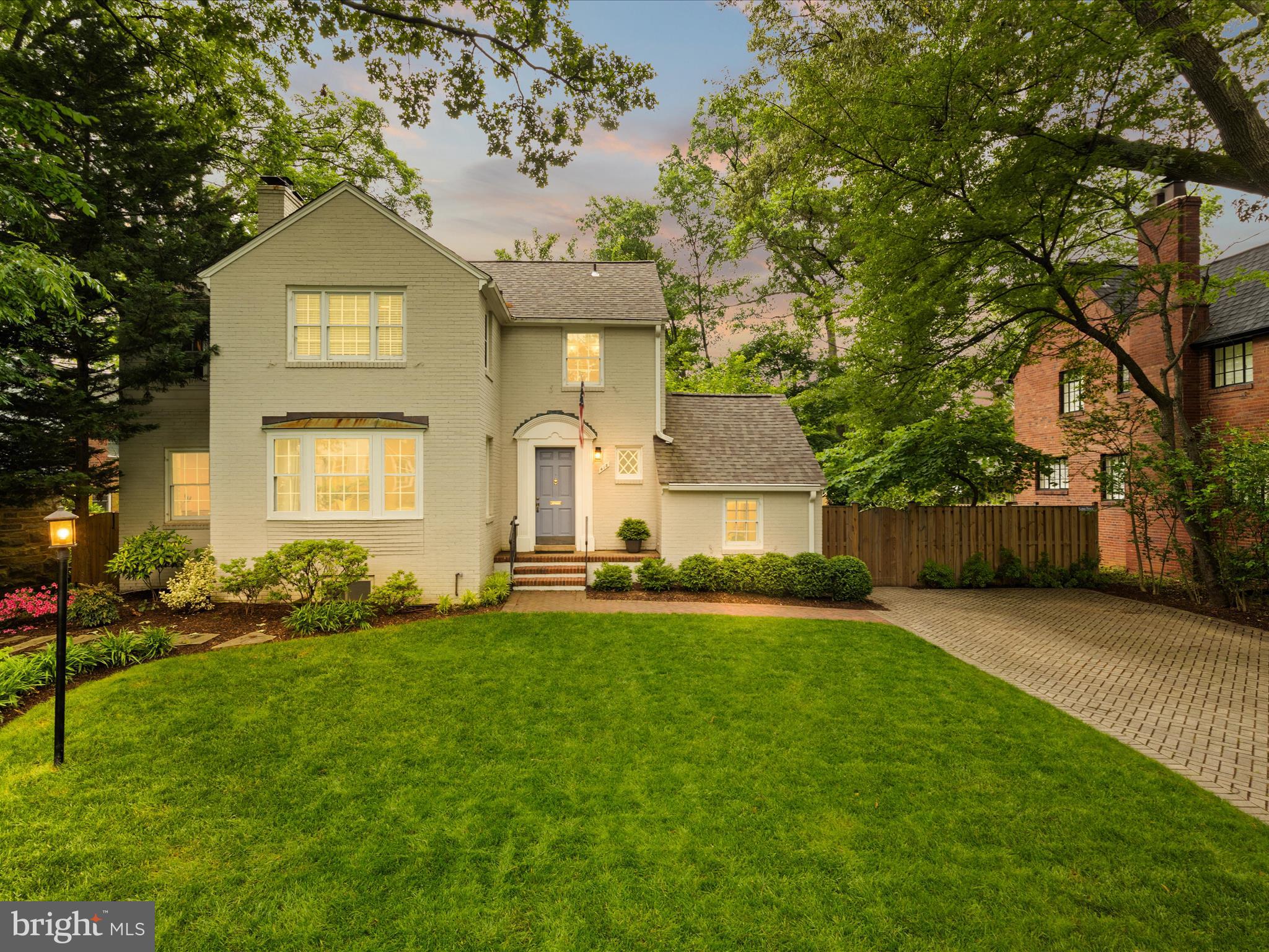 Step back in time to experience the traditional charm of a 1938 Colonial. Located in sought-after Ashton Heights, this residence combines the beauty of old and with the expansion and addition  of modern improvements to offer you the  best of both worlds.  
The main level consists of a large formal living room with wood-burning  fireplace, a formal dining room, a large kitchen with updated stainless steel appliances, a quiet office space. Just off the kitchen, step-down to a light-filled family room that accesses the fenced, rear yard/patio  There is also a updated powder room on this level.
The upper level provides a large primary suite with generous closets...yes more than one, a spa-like bath with oversized shower that has been tastefully done.  The 2 secondary bedrooms share a hall bath.
The lower level with a second wood-burning  fireplace offers a large recreation room which is conducive to a guest area when needed as there is a totally re-modeled full bath on this level.  Don't miss the laundry and  large walk-in storage room!
The exterior of the home is ever so appealing...it is a tranquil retreat with mature trees and as mentioned, a sought-after neighborhood with Metro .5 miles away...restaurants/coffee shops/parks/playgrounds that are  truly "in your back yard."  Offers if any, are due on Monday at 9 PM.  Sellers will respond on Tuesday