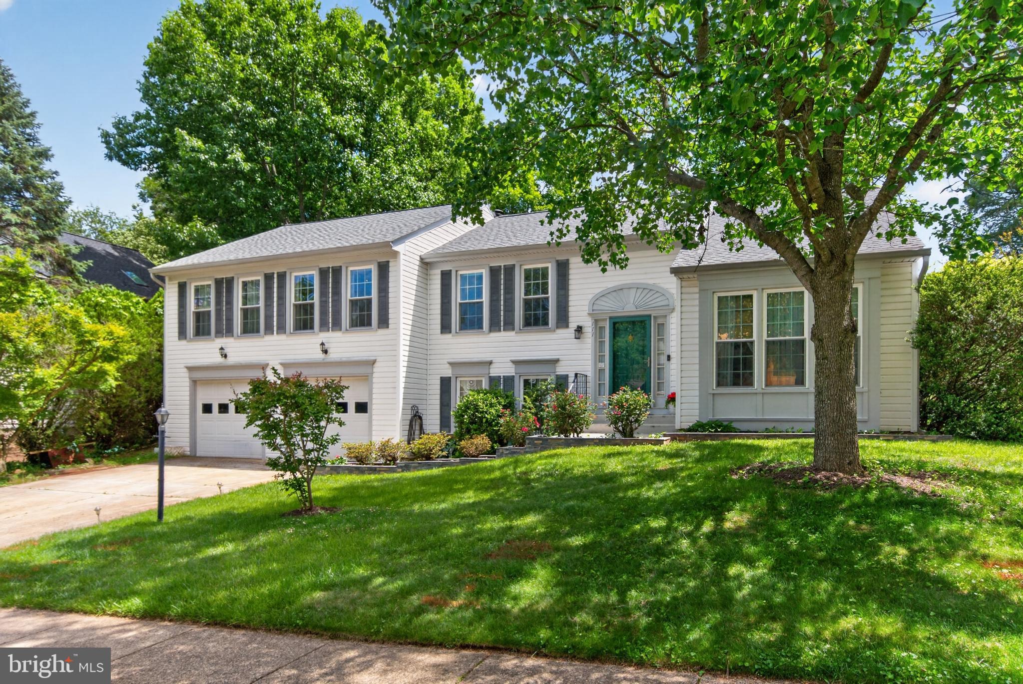 Welcome to 111 Environs Rd. in the sought-after Environs community of Sterling — a beautifully maintained and fully updated home that perfectly combines comfort, functionality, and pride of ownership. Situated on an incredible 1/3-acre lot backing to private trees, this 5-bedroom, 3.-bath residence offers spacious living, timeless charm, and exceptional indoor-outdoor entertaining spaces. Filled with natural light, the home features generously sized rooms, a formal living room, and an elegant dining room perfect for hosting gatherings. The updated kitchen showcases newer stainless steel appliances and opens to a dedicated breakfast room overlooking the backyard. The expansive primary suite is a true retreat, complete with a beautifully renovated bathroom featuring dual vanities and a frameless glass walk-in shower. Upper and lower levels are enhanced with newer engineered wood flooring throughout. Step outside to your private backyard oasis featuring a huge fenced yard, mature landscaping, a new Trex deck with lighting, and a dedicated shed with air conditioning — ideal for hobbies, storage, or a workshop. The front yard is equally impressive with in-ground lighting and an irrigation system that beautifully highlights the home. The fully finished lower level offers incredible flexibility with a large recreation room featuring a cozy Gas Fireplace, a fifth bedroom and a bonus flex room perfect for yoga or hobbies, and to top it off, second kitchen set up ideal for extended guests or multi-generational living. Major recent updates provide peace of mind, including: New roof (2025) with 50-year shingles New gas water heater (2025) HVAC replaced in 2021, Kitchen appliances updated between 2021–2025 Brand-new shed (2025) French doors replaced in 2016, ALL Windows, Vinyl Siding and Gutters replaced in 2007. This exceptional home truly has it all — space, updates, privacy, and an unbeatable setting.  HOA only $89 once a year!! Don’t miss the opportunity to make this Sterling gem your own today! Professional phots to come by Friday.