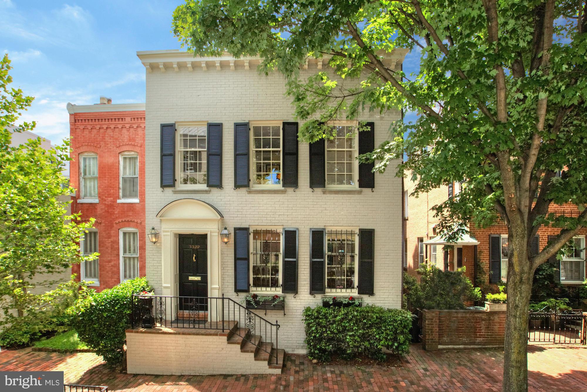 Four-level Federal townhouse in the heart of Georgetown with a stunning Hugh Newell Jacobsen addition, great room with floor-to-ceiling windows, gourmet kitchen, luxurious master suite, walkout lower level with large recreation room, and rooftop deck. The expansive rear garden offers a large patio and lush landscaping that leads to the 2-car garage. Sold in AS IS Condition