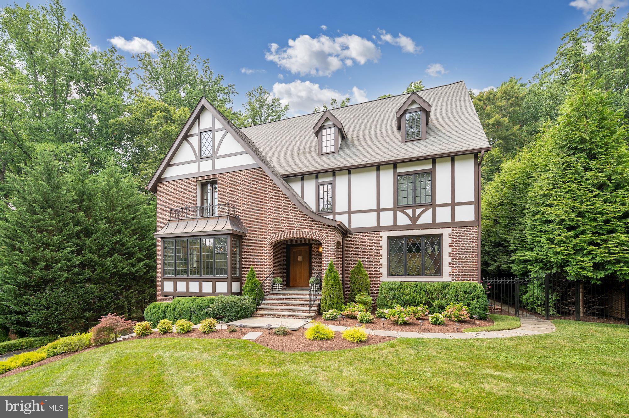 OPEN HOUSE CANCELLED.  Welcome to 7015 Arandale Road, a truly elegant custom-built residence, sited on a half-acre private and flat lot in desirable Bannockburn. This Craftsman-Tudor home provides modern conveniences with elegant charm and features a covered entry, diamond patterned triple casement windows and cast concrete window accents.  Approximately 6,000 SF of finished living space on four levels showcasing traditional Tudor elements and architectural details throughout make this home one-of-a-kind and a cut above the rest.  Some of the very special features are a grand stone floored foyer; dining room boasting 5 bay windows and rough hewn ceiling beams; a large living room/study with herringbone floors; gorgeous great room with stone surround fireplace; gourmet chef's Kitchen with custom cabinetry, Sub-Zero, Wolf, Dacor and Bosch stainless steel appliances, porcelain English farm sink, leathered quartzite counter-tops and butler's pantry;  a windowed breakfast room overlooking the private, level garden and spacious rear lawn; a  luxurious primary suite with cathedral ceilings, primary bath with walk-in shower with rain and hand held shower heads, Kohler jetted tub, Thermasoft heated marble tiled floor and the most exquisite walk-in closet imaginable; three additional bedrooms and two full baths; a bright 4th floor that includes two skylights, a 1,000-volume library, must-see loft with access via children's door, reading nook, bedroom and full bath and a lower level that includes a second family room, bedroom/exercise room, full bath and breakfast bar. Some of the special amenities include herringbone oak floors, elevator, oversize 2 car garage, arched covered brick porch, stone patio with built-in outdoor kitchen and a fully fenced and secured, level and professionally landscaped backyard.  Walking distance to the Canal, Glen Echo Park and more.  Just minutes to downtown Bethesda, Georgetown and McLean.  Must see to believe, as there’s nothing else quite like it on the market.