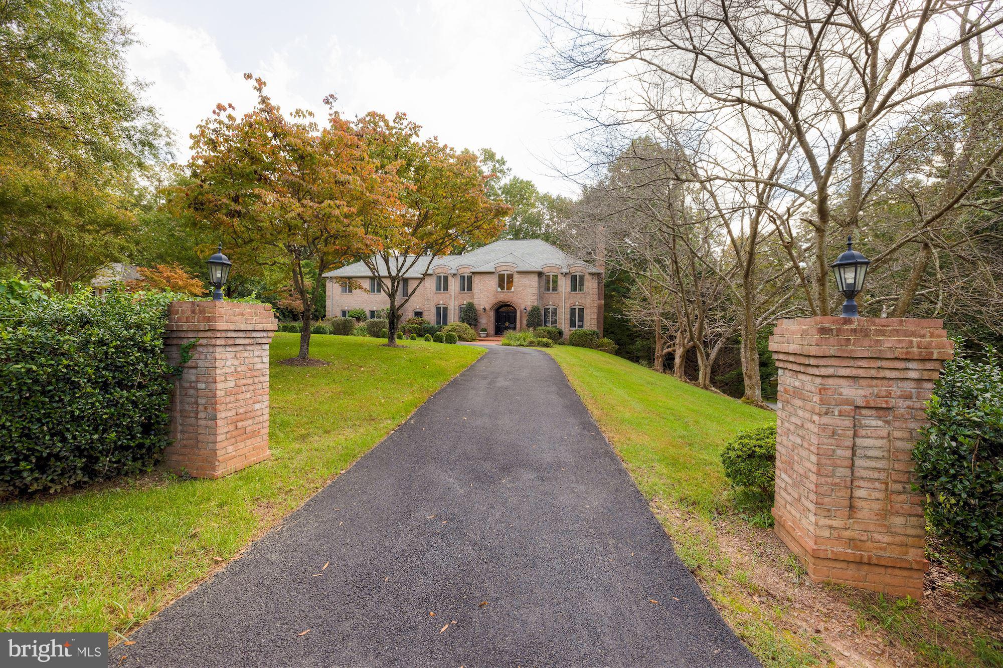 Totally new look! Stunning and completely updated all-brick colonial located in sought after Potomac Overlook. Sited on nearly an acre, this beautiful home backs to parkland and is only a short walk to Scott’s Run Nature Preserve with over 300 acres of woodland trails, Potomac River Views and a waterfall.

The home is filled with light and has a nice flowing floor plan. There has been meticulous attention to details: hardwood floors, over-sized windows, beautiful plaster moldings, arched doorways, 4 fireplaces and front and rear staircases are just a few of the features. There is a grand foyer with a two-story ceiling, curved staircase, marble floors and a dramatic Italian Schenbeck chandelier to welcome you. The spacious living room with a fireplace and spacious formal dining room makes casual or formal living, and entertaining, a joy. The over-sized family room offers a floor-to-ceiling stone fireplace , wall of glass and French doors leading to the private deck. The library has cherry built-in cabinets, bookshelves and a window seat. A gourmet kitchen offers top-of-the-line appliances, granite counter tops, heated floors and a sky-light over the breakfast nook which has a bay window, built-in bench and access to the expansive backyard deck. Additionally, there are two powder rooms and a laundry room/mudroom with separate exterior access, and a three-car garage.

The primary bedroom suite is a true retreat featuring a large bedroom with a fireplace, separate sitting room, three walk-in closets including a cedar-lined closet and a bathroom that feels like a spa and offers dual sinks, seamless glass shower, jetted tub, sauna and heated floors, along with skylights and a Juliet balcony to allow in ample light. The upper level provides four additional bedrooms, two of which are bedroom suites. The walkout lower level opens to the backyard patio and features a large recreation room with a wet bar and brick fireplace, in-law suite with kitchenette and bedroom, plus an additional bedroom, full bath and finished storage room.

With beautiful and lush plantings throughout the grounds, the front yard offers a convenient and grand circular driveway while the backyard offers ample privacy with mature trees, a large deck and lower-level patio. The large front yard is also perfect for soccer and other fun sports.

The home has been sturdily constructed with 2x6 framing stud exterior walls on the North and West Side Walls which provides energy savings of over 40% according to the sellers. 

Potomac Overlook is minutes to downtown McLean and the Beltway.  This premium location affords easy access to the Beltway, Tysons Corner and the George Washington Parkway which offers a scenic downtown commute.  Also convenient to Dulles and National Airports.