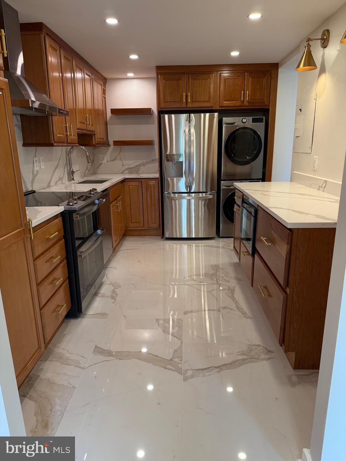 Rarely available Watergate G model gorgeous 2 large BR/2BA unit in a secured resort-like gated community! Stunning kitchen with stainless steel kitchen appliances w/in-unit full size washer/dryer. Plenty of closet space and extra storage. Rent includes all utilities (heat, electricity, cooling, water) and surface parking spaces. Gym, indoor/outdoor pools, mini-golf, tennis courts and more. Move-in fee will be assessed per updated condo association terms Condo fees paid by landlord.