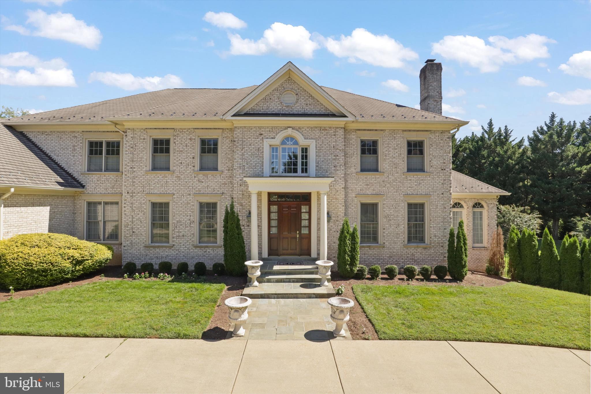 Welcome to the classic beauty of a Round Hill original!
Sheer elegance with an artful twist.  This CH Edmunds built home has been beautifully updated with over $600,000 in renovations by the current owners.  It is the perfect combination of classic beauty and modern flair.  As you enter the foyer, notice the exquisite millwork with arches and Corinthian columns defining the formal dining room, living room and hall to both sides of the home.  The foyer marble flooring changes to wide plank white oak that is throughout the rest of the main level and upstairs.  On one side is the open, modern European style kitchen with breakfast bar, eating area and casual family room with fireplace opening to a spacious back patio.  The family room is a perfect example of the classic meets modern theme of this house – elegant arched cutouts (one roughed out for a wet bar) and crown molding that includes alcove lighting remote controlled for whatever color is your mood.  On the other side of the foyer is a sunroom/tea room and office/bonus room as well as a powder room.   A yoga room and greenhouse, 4 car garage, laundry room and four full height closets complete the level.  Upstairs, accessible by both a front and back staircase, includes several bedrooms that could be considered primary suites.  All four bedrooms have ensuite baths with two including state-of-the art tubs with massage jets and one with a light therapy option.  Shower closets in each, several of which have the three options for above, handheld and wall jets, and smart Toto toilets in each.  The primary bedroom includes a kitchenette as well as a spa/bath including makeup area and large closet with separate shower and large soaking tub.  The basement area includes 2 bedrooms connected to a full bath, as well as a powder room and is also equipped with a gym (equipment and sauna negotiable), theatre, additional family room with fireplace and wet bar and a billiards area.  The backyard is perfect for entertaining a crowd or enjoying the natural surroundings with a patio surrounding a large rectangular pool, separate hot tub and cabana with full bath and wood burning fireplace.  Separate outdoor kitchen area is also available.   This is your chance to be part of the Round Hill community with its stately homes and peaceful setting in prestigious Potomac!

*** PLEASE be respectful of the residents and DO NOT enter the property unless you have an appointment to view the home.  Every effort will be made to meet your schedule.