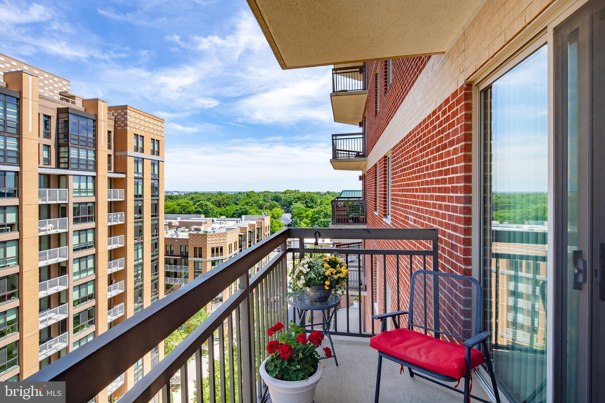 HIGHLY SOUGHT AFTER BRIGHT & SPACIOUS 2BR, 2BA VIRGINIA SQUARE CONDO ***  Split Bedroom design for ultimate privacy.  Gleaming wood floors, gas fireplace, and sliding glass door to the wrap around balcony. ** Stainless steel appliances ** Large closets ** Spacious living and dining areas ** This condo lives LARGE with over 1,100 sf of living space! ** Top notch amenities in a top notch building:  Outdoor swimming pool, Great Fitness Center, Game Room, Billiards table, Community Room, and excellent on-site management ** One garage parking space included in the rent  (2nd available to rent) **  All located directly across the street from VA SQ Metro and just a short stroll to eateries, shopping, grocery and more ** Pets under 25lbs considered on a case by case basis ** Available July 1.