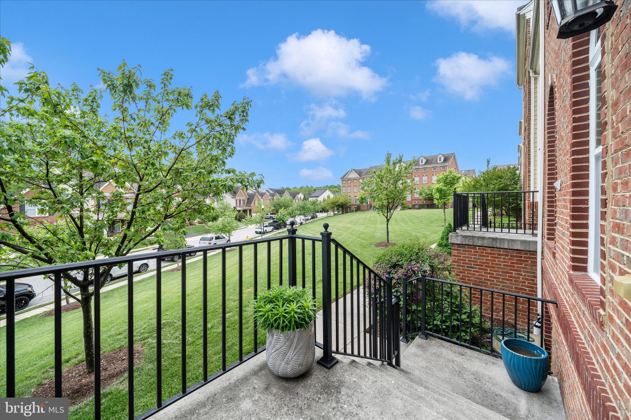 Welcome to 7673 Elmcrest Road, Hanover, MD 21076—a beautifully maintained brick-front townhome offering four finished levels, a rare two-car garage, hardwood floors, and exceptional living space in one of Anne Arundel County's most convenient locations.

This spacious Hanover townhome features elegant Palladian windows that fill the home with natural light, gleaming hardwood flooring, multiple living and entertaining areas, and a thoughtfully designed floor plan that provides flexibility for today's lifestyle. Whether you need space for a home office, guest accommodations, recreation room, or multi-generational living, the four finished levels offer room to grow and adapt.

Outdoor living is equally impressive with two private decks, perfect for morning coffee, outdoor dining, or relaxing after work. The low-maintenance exterior allows more time to enjoy your home and community.

A standout feature rarely found in comparable townhomes is the attached two-car garage, providing secure parking, additional storage, and everyday convenience.

Located in a sought-after Hanover community, residents enjoy sidewalks, a clubhouse, and a community swimming pool. The neighborhood offers easy access to shopping, dining, entertainment, and major commuter routes.

For military, government, and technology professionals, the location is exceptional. The home is minutes from Fort Meade, NSA, Arundel Mills, Maryland Live! Casino, BWI Airport, and major employers throughout the Baltimore-Washington corridor. Commuters will appreciate convenient access to I-295, Route 100, I-95, and Route 32, making travel to Annapolis, Columbia, Baltimore, and Washington, DC simple and efficient.

Key Features:
• Four finished levels
• Brick-front exterior
• Two-car attached garage
• Hardwood floors
• Palladian windows
• Two private decks
• Community clubhouse and pool
• Convenient Hanover, MD location
• Near Fort Meade and NSA
• Easy access to Baltimore, Washington DC, Columbia, and Annapolis

If you're searching for a move-in ready townhome in Hanover, MD with abundant living space, community amenities, commuter convenience, and outstanding value, 7673 Elmcrest Road deserves a place at the top of your list.