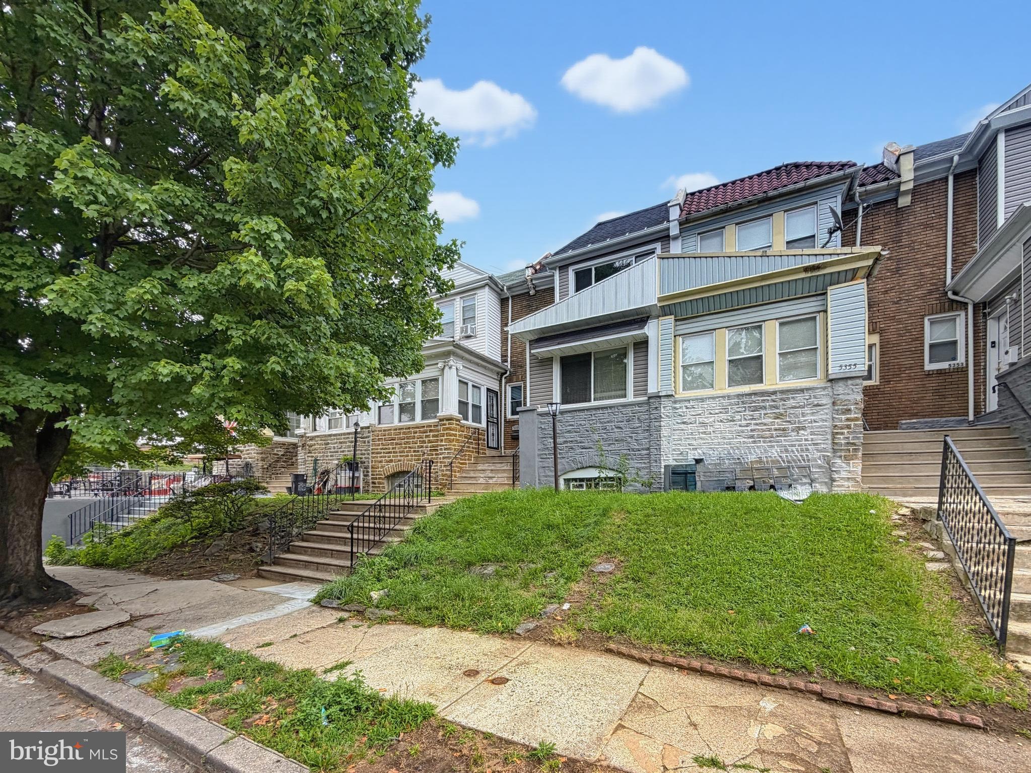 Welcome to this stunning, fully rehabbed home in Logan. This home has unique charm and charisma. It offers bedrooms, 2 full baths, and a powder room, electric fireplace, fully finished walkout basement, wooden deck, and more… Plenty of main floor entertaining space. Living and dining area extends into an open concept kitchen. Off the kitchen enter to a large wood deck perfect for any social gatherings, summer grilling, or just simple breath of fresh air in the morning. All new stainless steel appliances, stone counter tops, new kitchen two-tone cabinets, large center kitchen island. Fully finished walkout basement with powder room. Upstairs offers 3 large bedrooms with ample closet space and a large hall bathroom with beautiful tile-work where none of the details were overlooked. Owners bedroom has a full bath with beautiful tile work and shower. Full fully finished walkout basement with the 4th bedroom and a powder room. Close to public transportation, shopping, and entertainment. Other items that were not overlooked; new windows, new plumbing, electrical, water heater, new central air HVAC system, and new roof. Don't hesitate and schedule your showing today. You will not be disappointed.