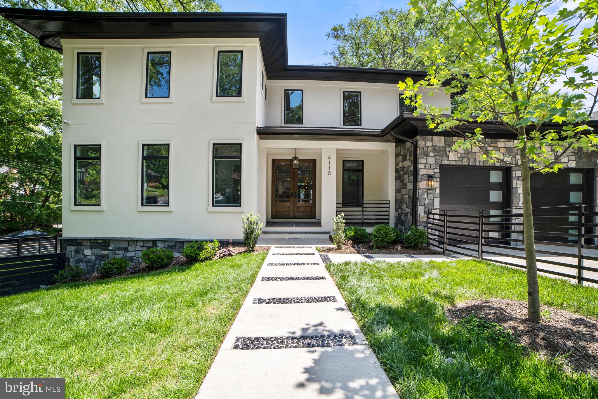 Stunning New Modern Custom Home by premier local builder Merit Homes with superior craftsmanship and incredible attention to detail. This 6 bedrooms, 5 full and 1 half bathroom house has an open light-filled design. Main level features 2 car garage, mud room, bedroom with full bathroom, dining room with batters pantry, powder room, expansive gourmet kitchen with 6 burner stove, a large island, opened to a family room with fireplace and access to the large screened deck completing your perfect indoor/outdoor relaxation spot.
Upper level owner's suite has large walk-in closet, an expansive private balcony, a luxury bathroom with double  vanity, free standing tub and spa like shower.
The lower level includes recreation room with modern fireplace, wet bar, game area, wine cellar, exercise room,  bedroom with full bathroom.